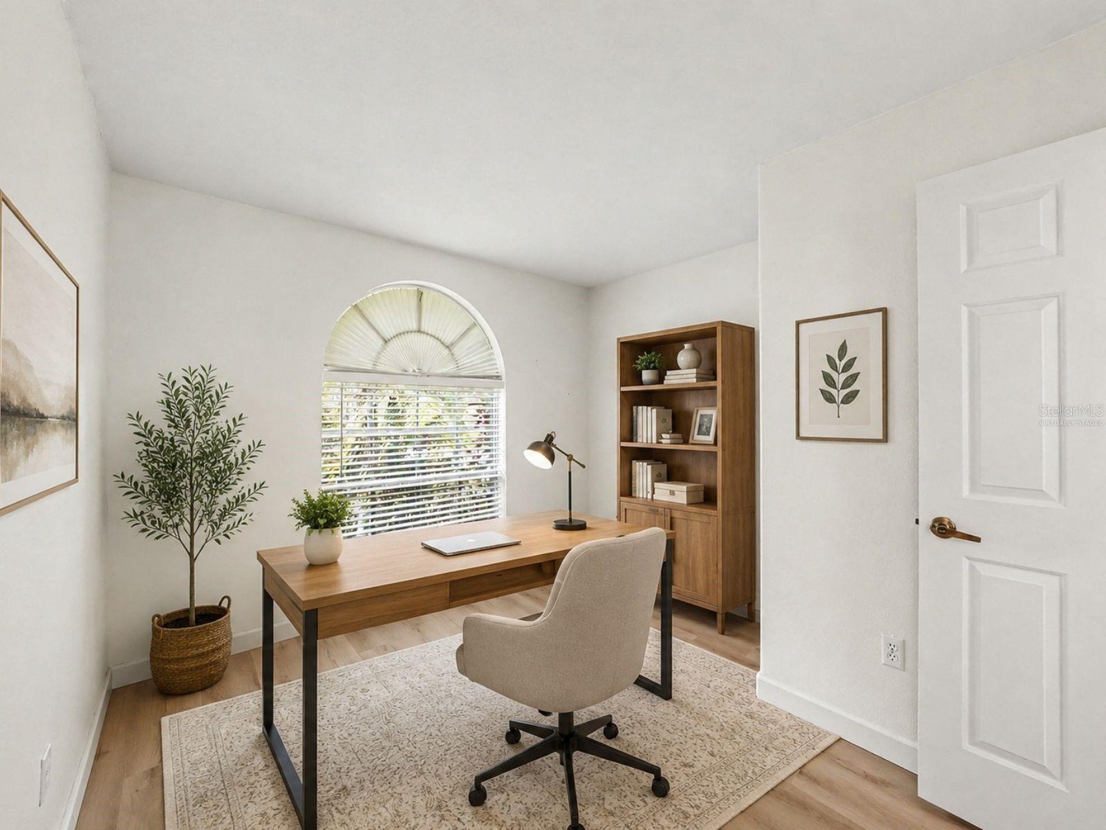 bedroom 2 virtually staged as an office