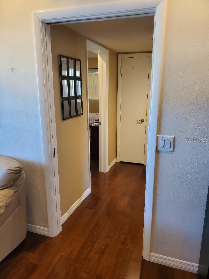 Pocket door to back bedrooms