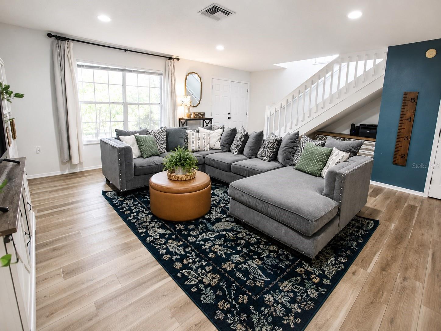 Living Room – Bright and spacious living room with an open-concept layout.