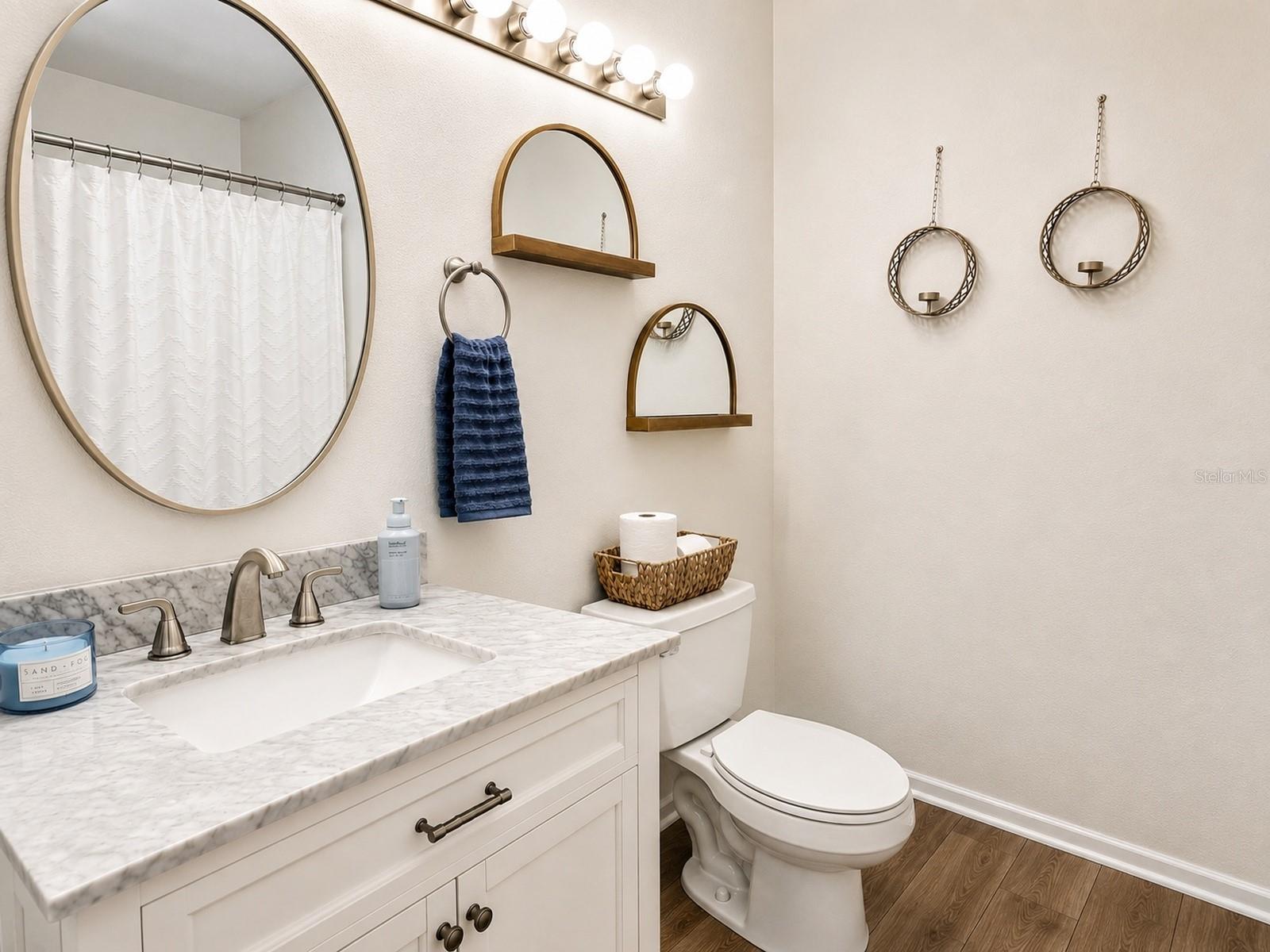 Full Bathroom – Updated full bathroom with modern vanity and finishes.