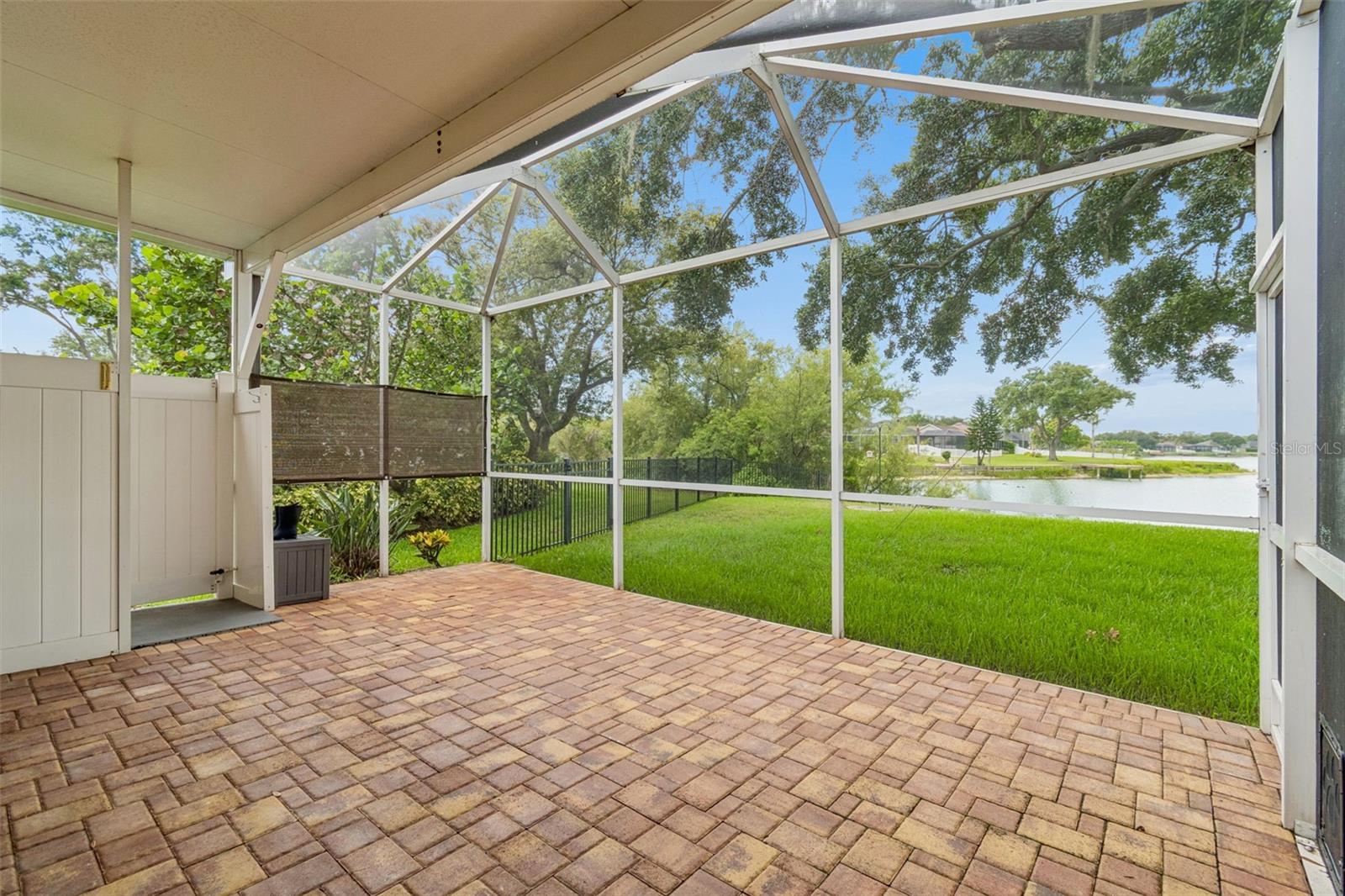 Paver, screened in Lanai with secluded outdoor shower