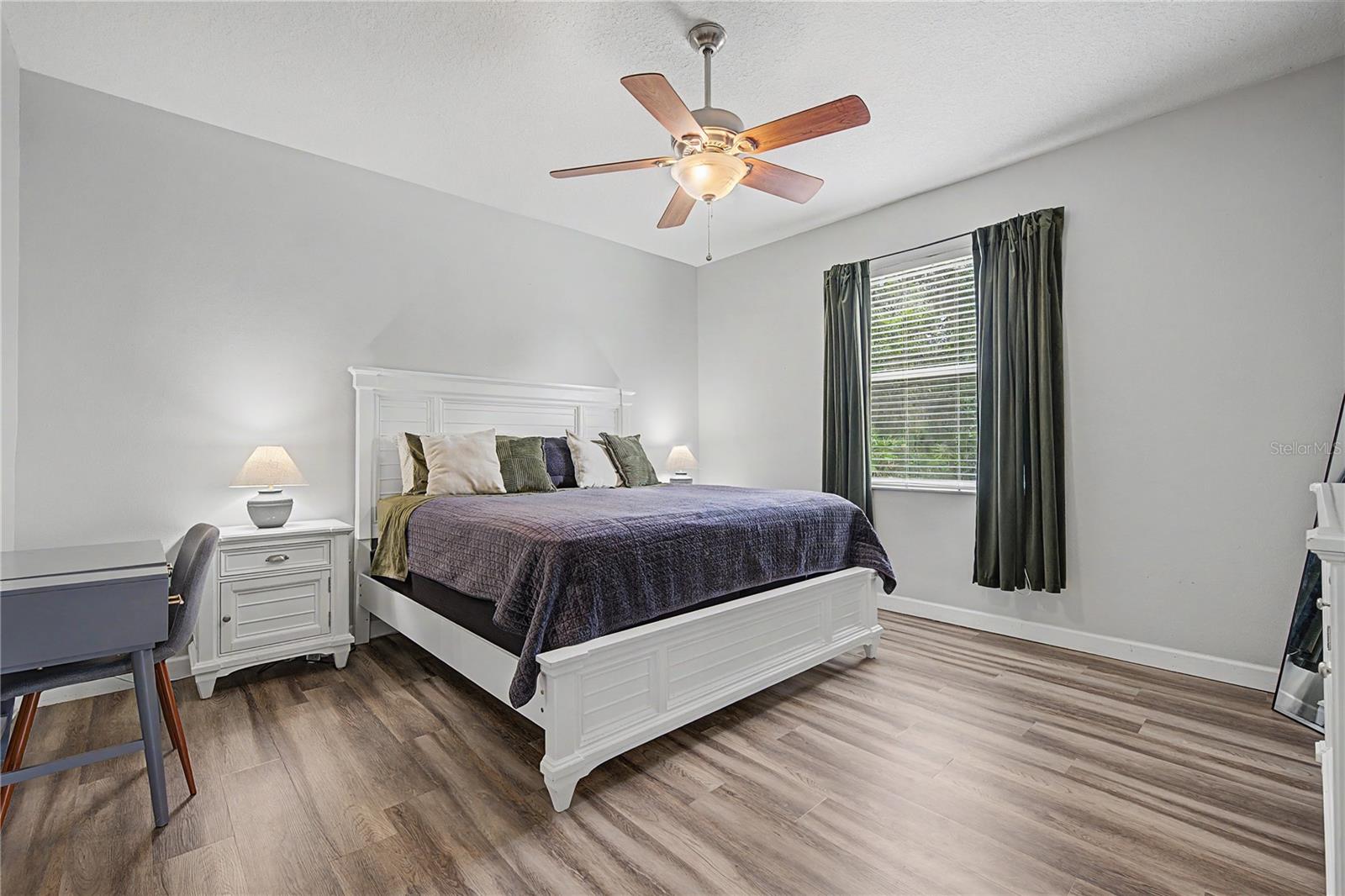 Primary suite with backyard view