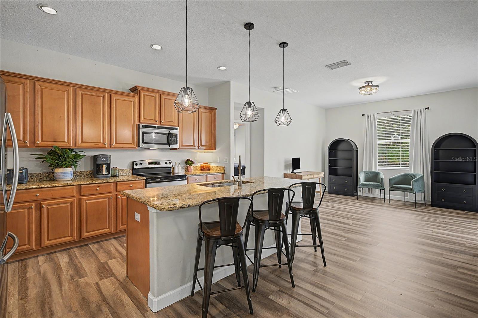 Spacious kitchen is open to dining area and great room