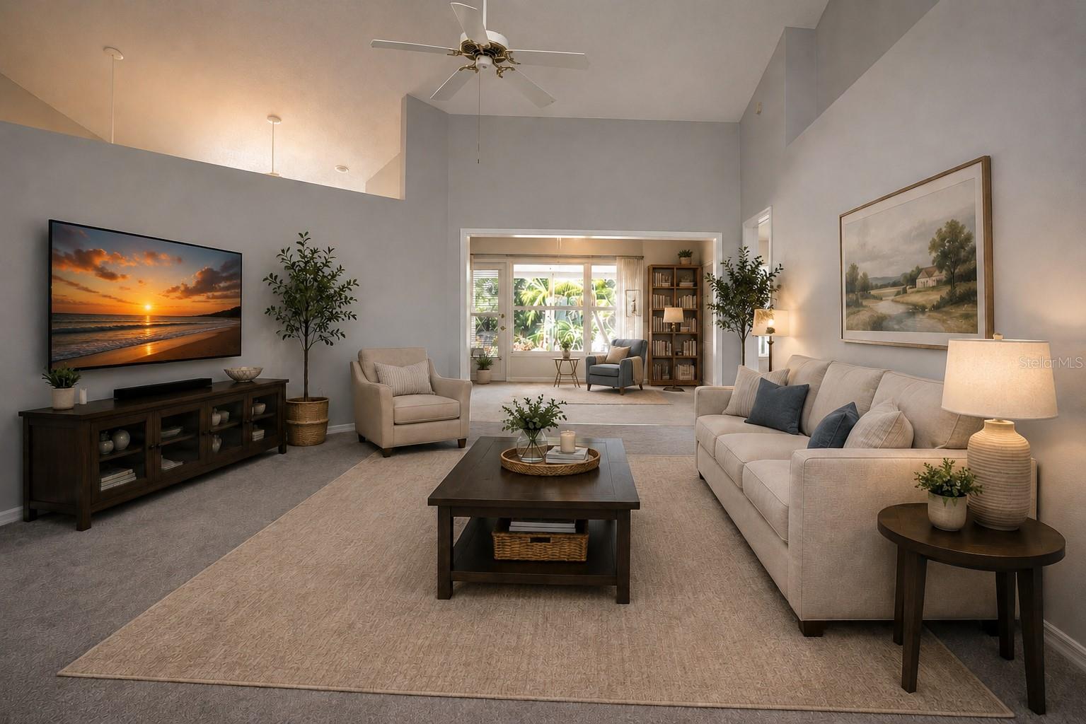 Staged Living Room w/staged Family Room beyond