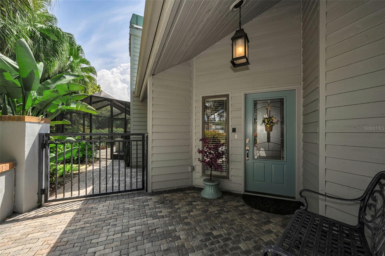 Garden gate and lovely front door entry to your private oasis, 10497 Longwood Drive.