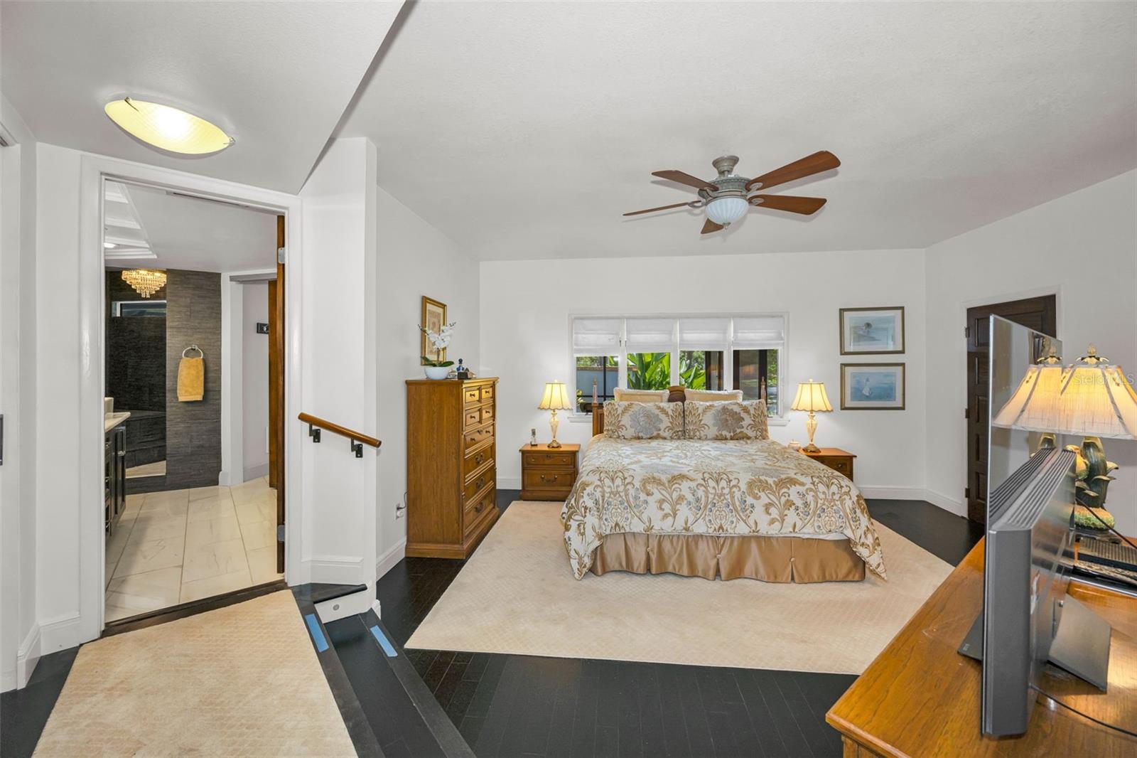 Master bedroom and ensuite bath with walk in shower, walk in closet and sitting area...With a pond view!