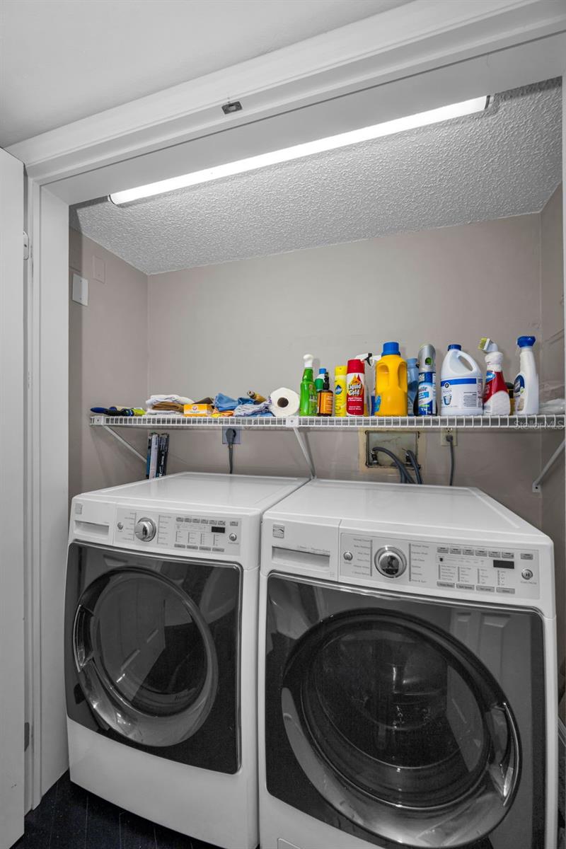 Laundry closet in the back hallway near the bedrooms.