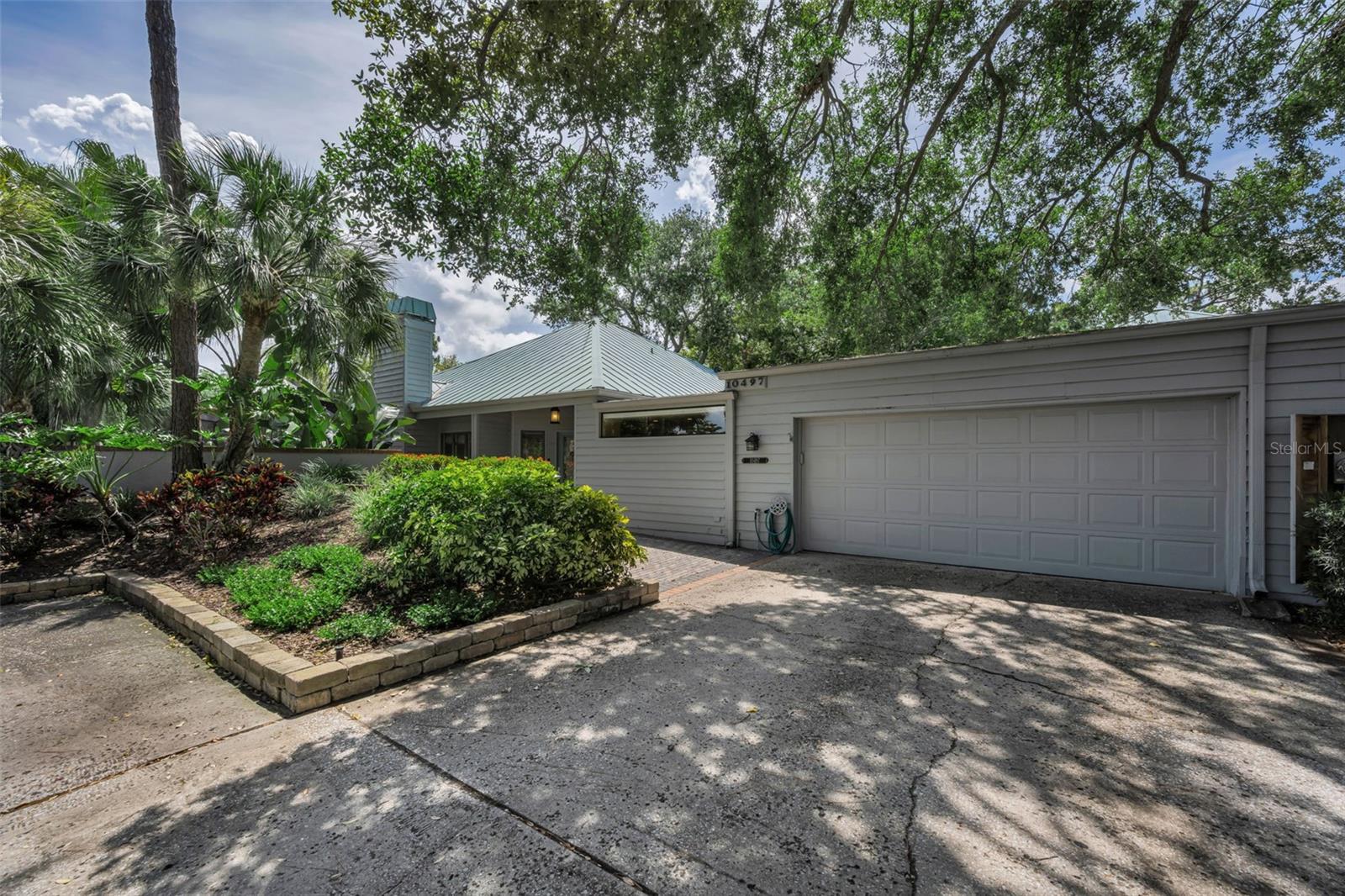 Private entrance and two car garage plus off-street guest parking just outside your door! 10497 Longwood is the perfect spot for a carefree lifestyle. Low HOA fee of $265. per month!