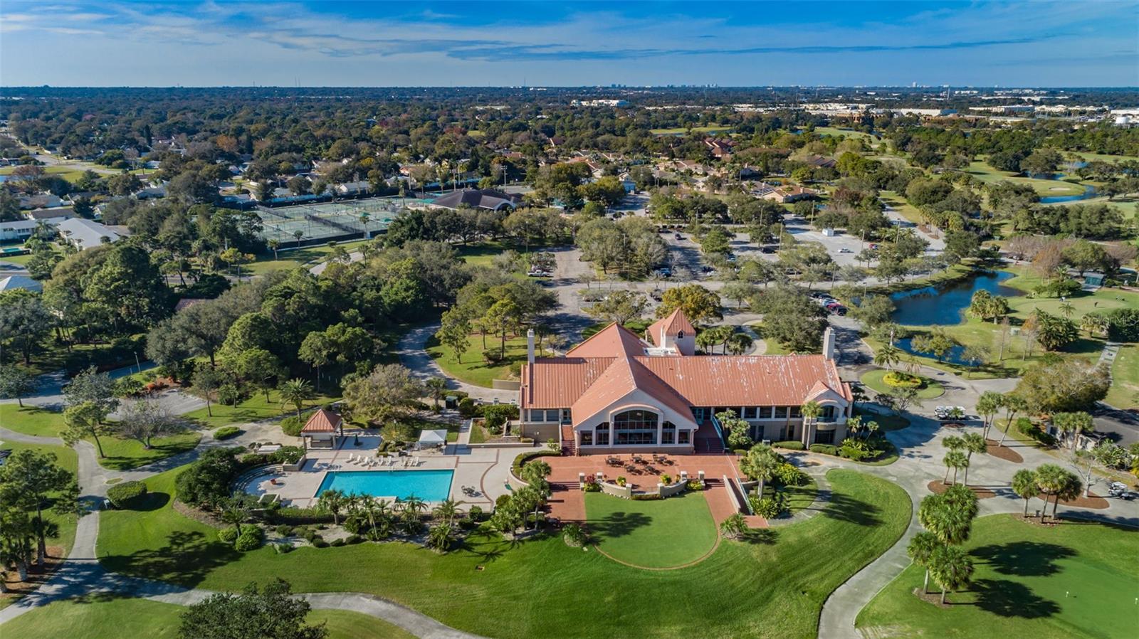 Bayou Clubhouse looking north with both golf courses and tennis visible; Bayou and Bardmoor North,