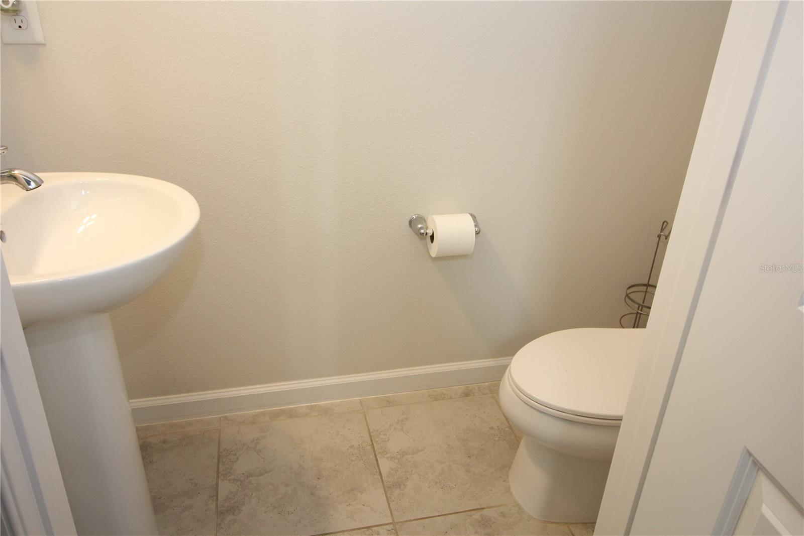 downstairs half bath off living room area