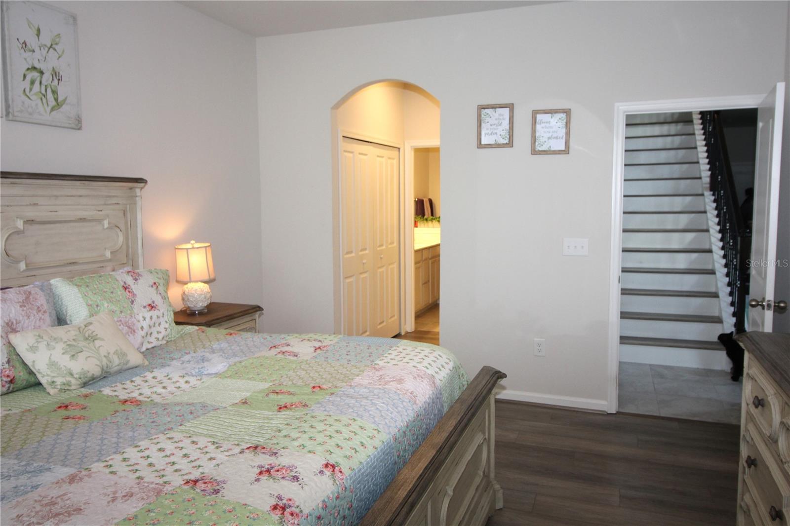 primary bedroom....built in closet in hallway leading to primary bath