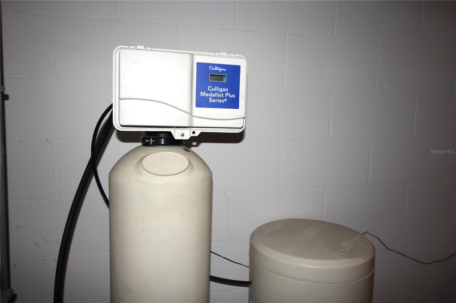 water softener in garage and water filtration system under kitchen sink stay with the home!