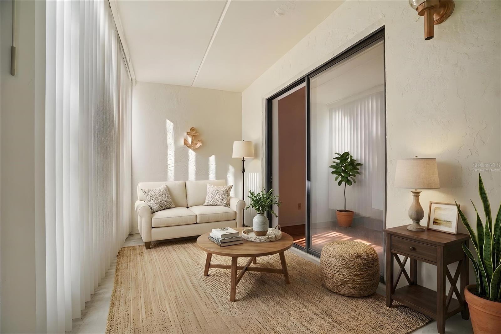 Extend Your Living Space. The enclosed screened lanai provides a comfortable setting to relax while enjoying the peaceful, tree-lined surroundings. Virtually staged photo.