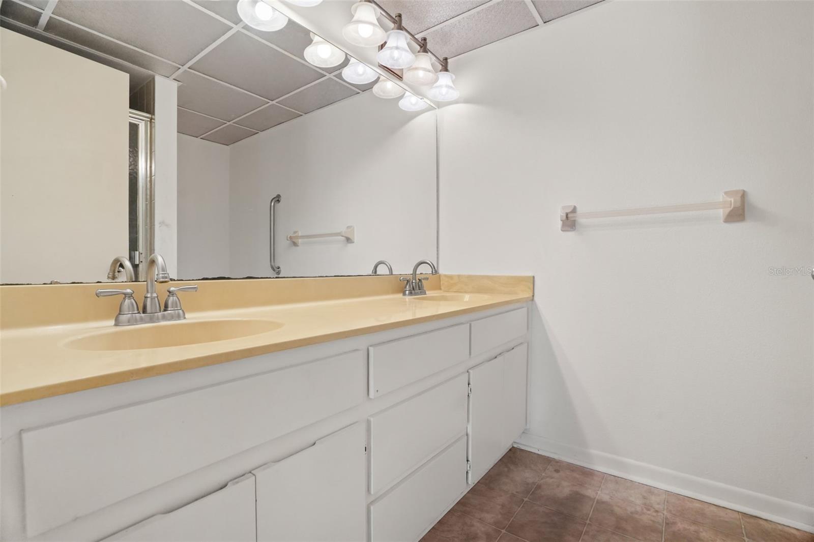 Ready for Your Personal Touch. A spacious vanity with abundant storage provides a solid foundation for future updates.