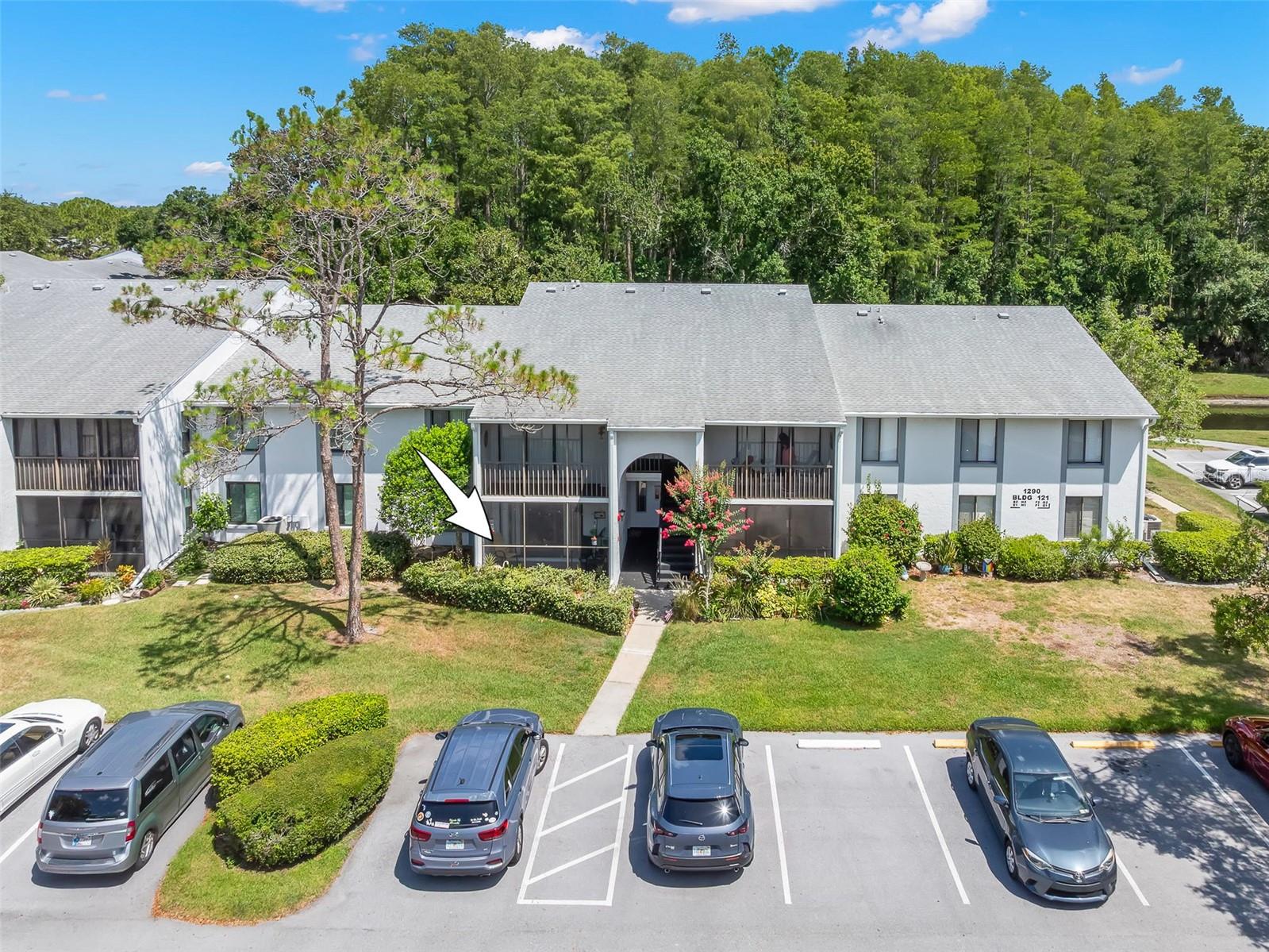 First-floor convenience, assigned parking just outside, and a beautifully maintained, park-like community in the heart of the East Lake corridor.