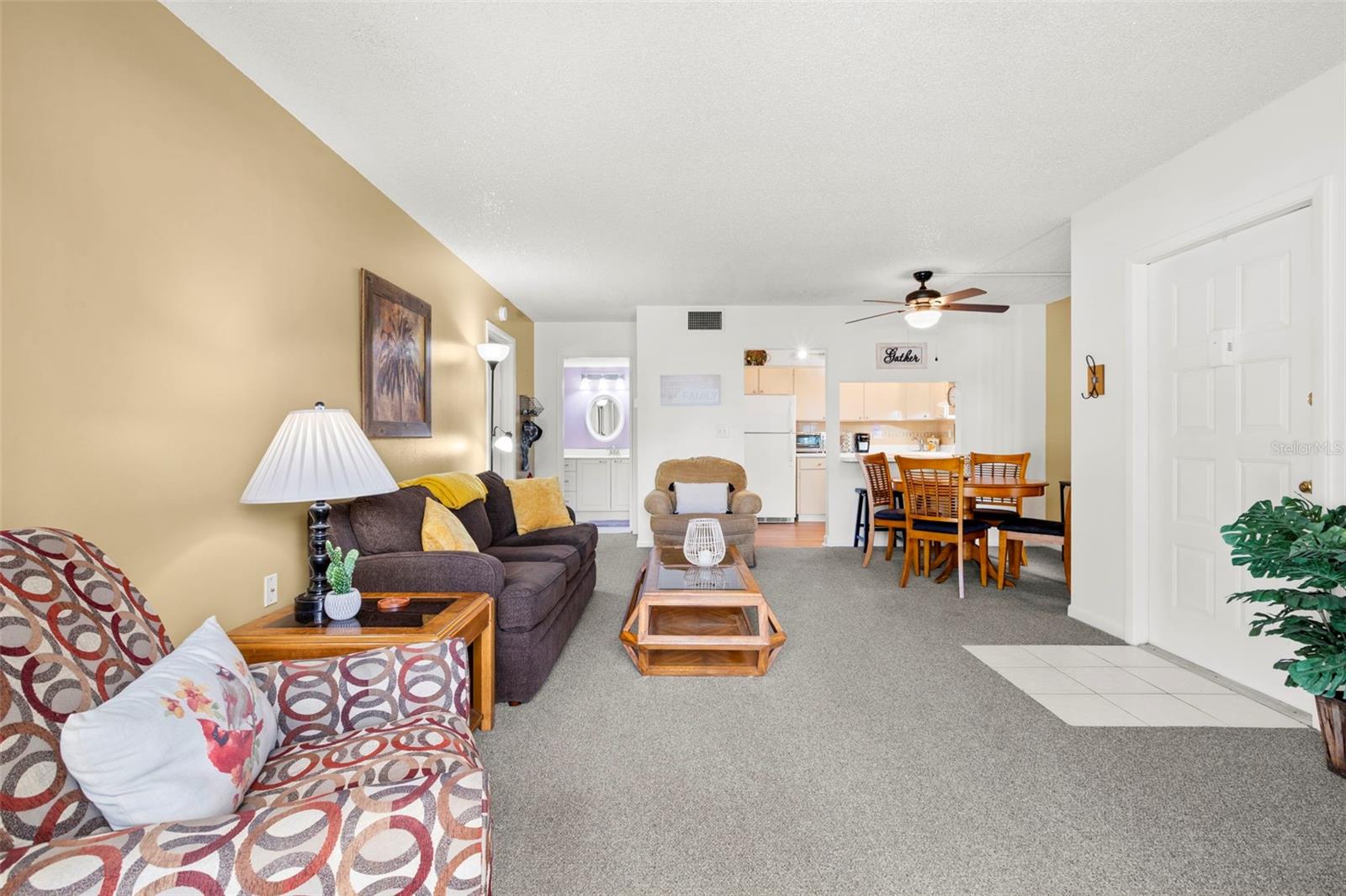 An open layout creates a natural flow between the living room, dining area, and kitchen, making the home feel bright, connected, and surprisingly spacious.