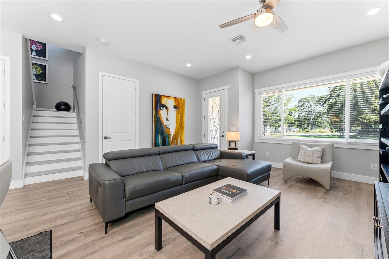 Living Room with high-ceilings and open concept living made for real life
