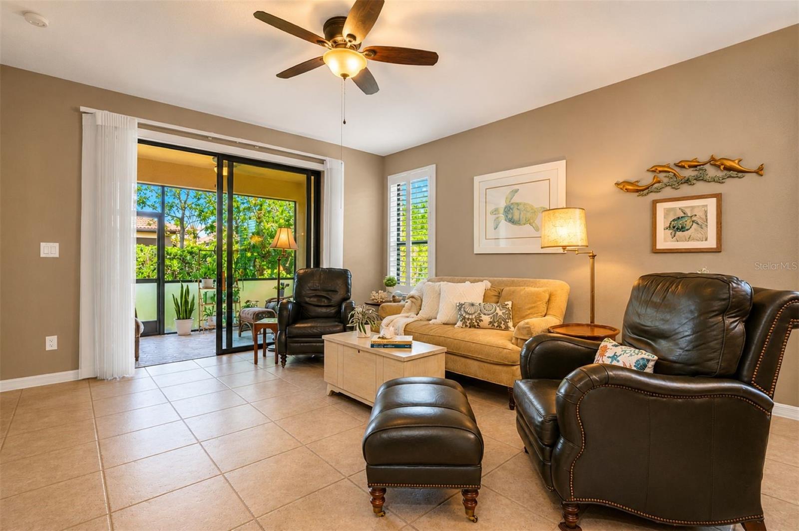 Open layout to screened patio. Tile throughout. Plantation shutters newly installed.