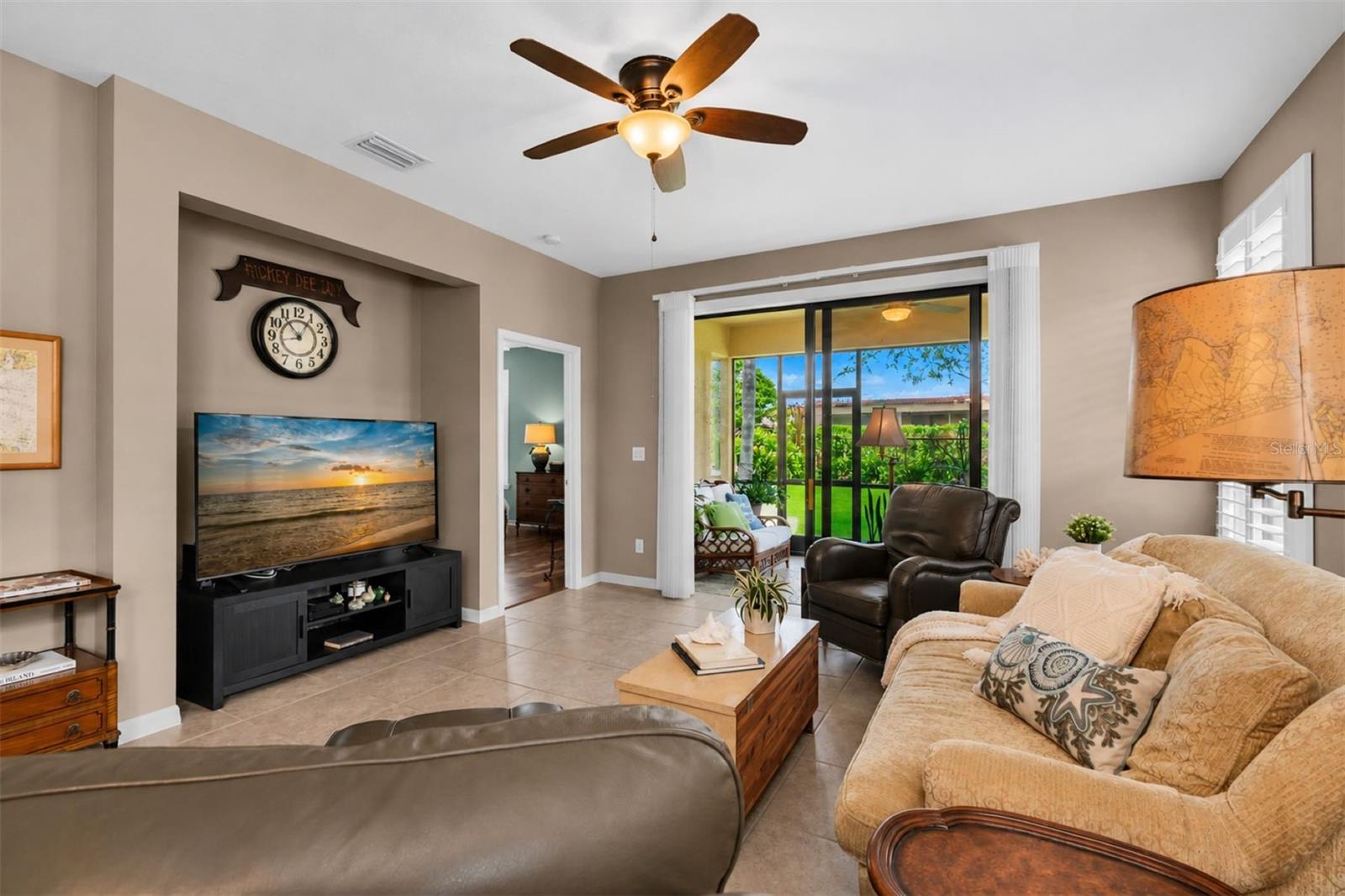 Open layout to screened patio. Tile throughout. Plantation shutters newly installed.