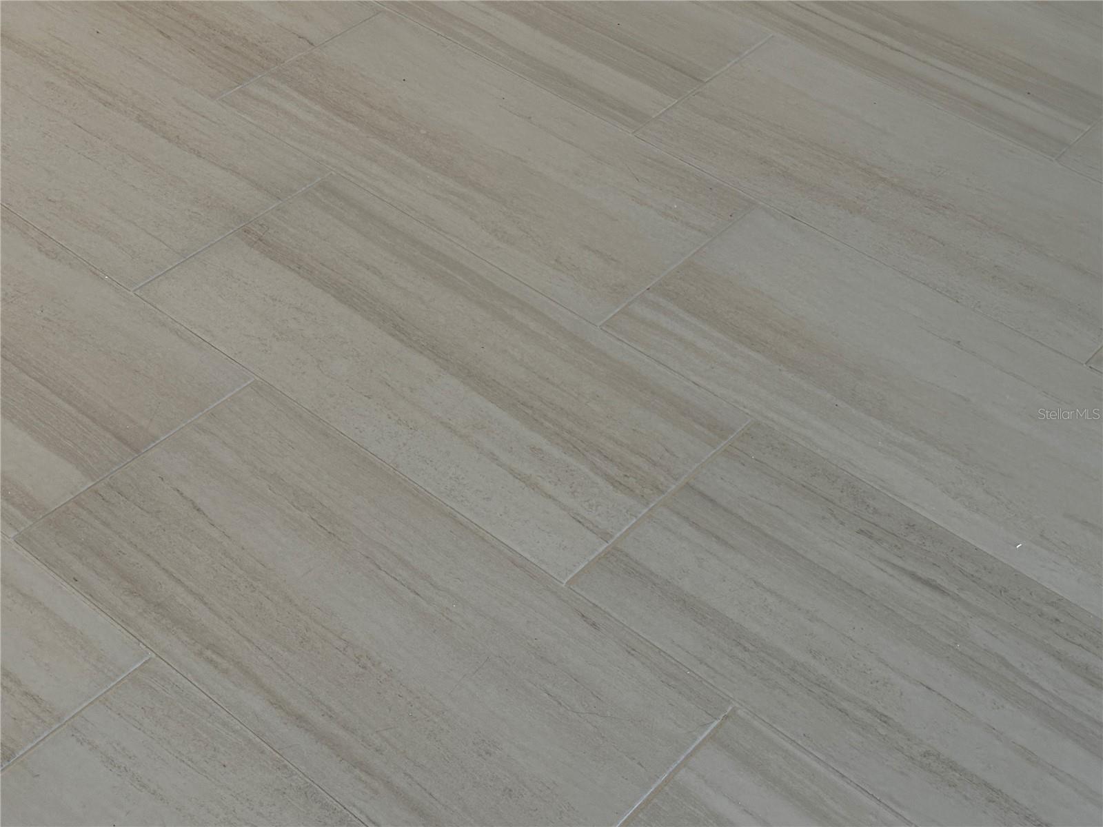 ceramic tile through the downstairs living area