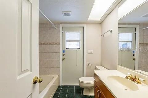 Guest bathroom with pool access