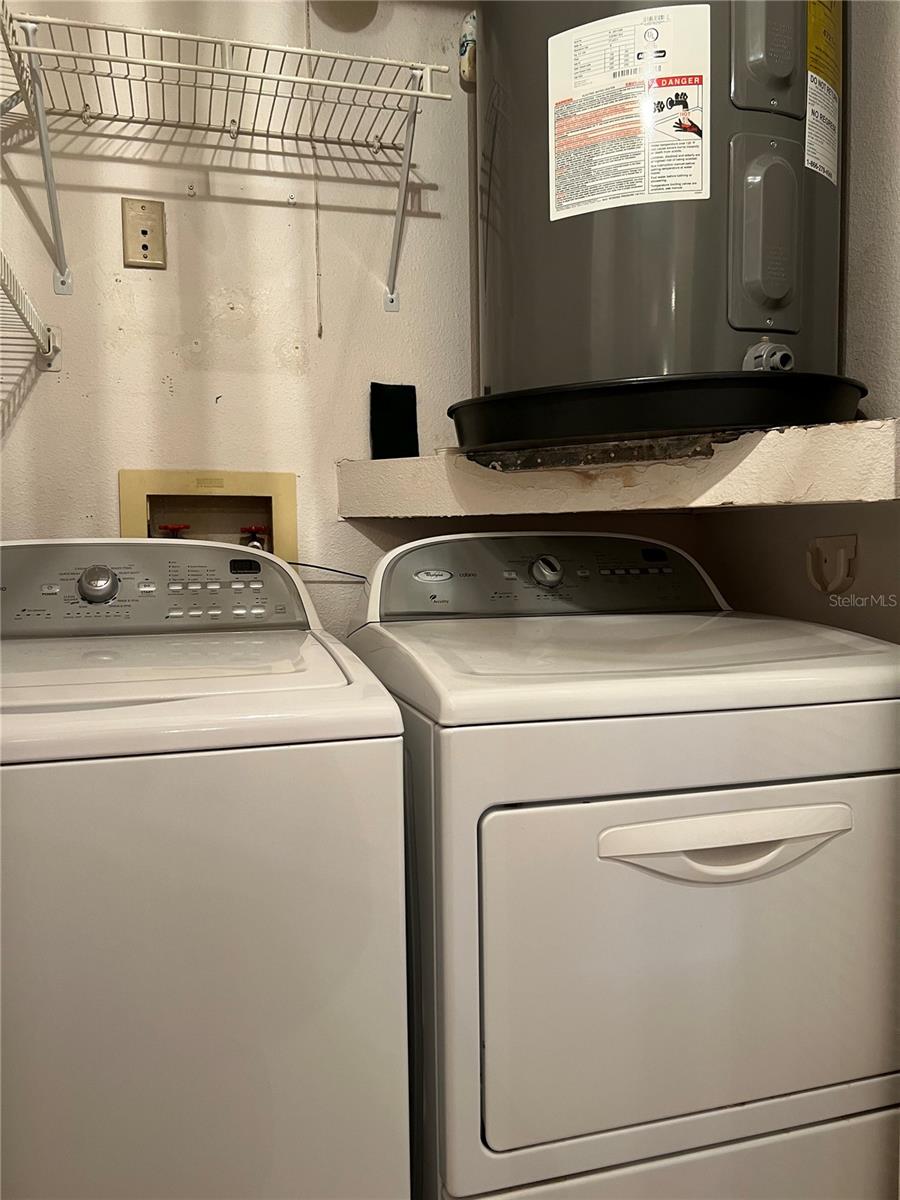 Laundry closet, washer and dryer included.