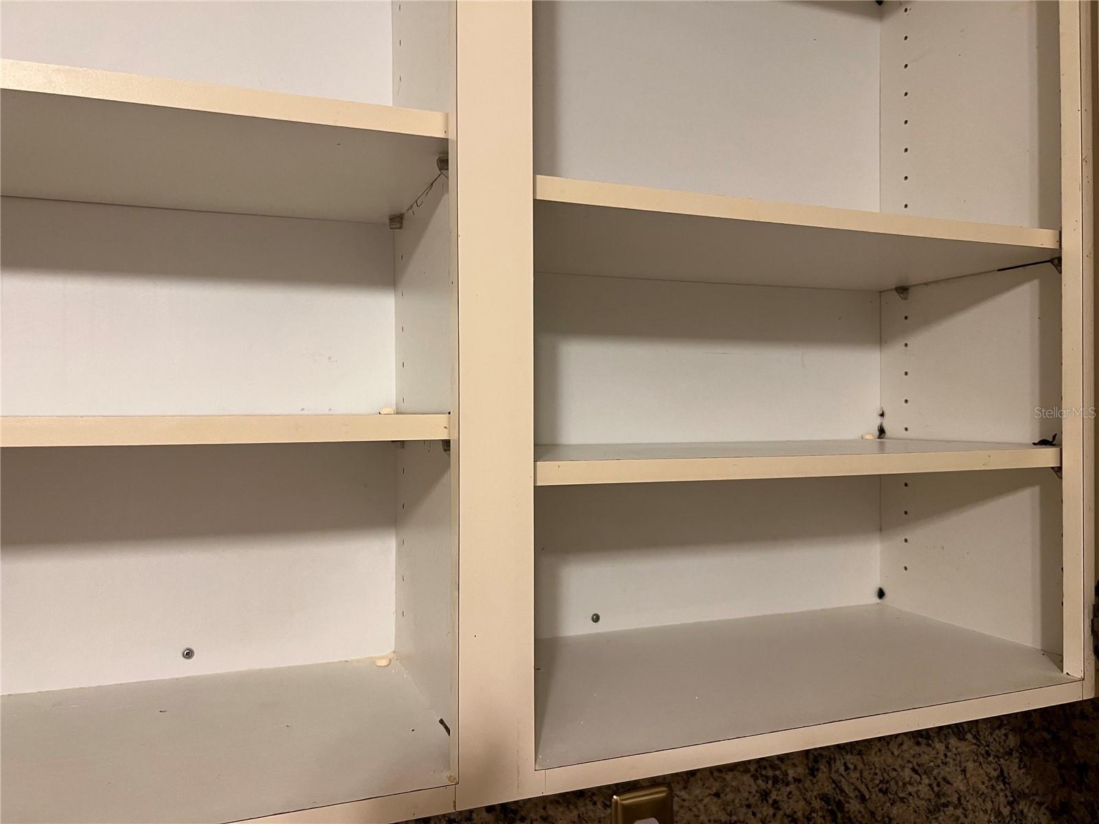 Adjustable kitchen shelving.