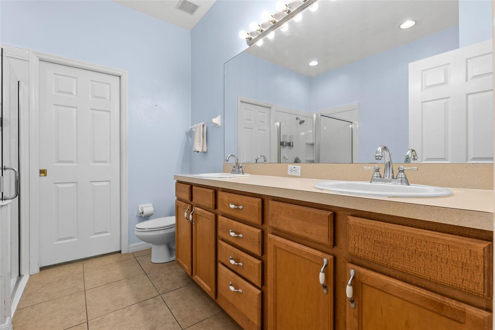 Primary Bathroom with dual vanities