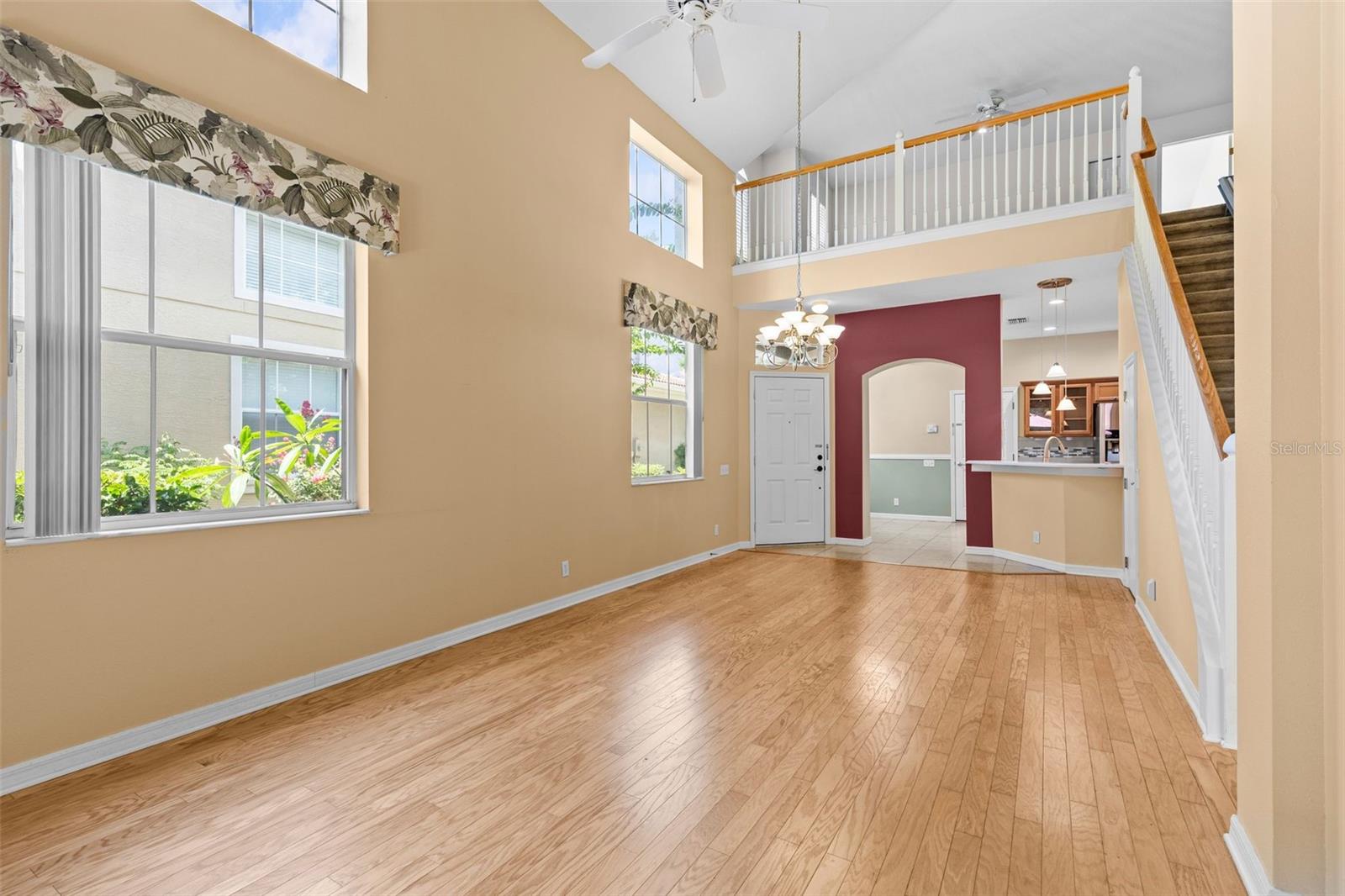 Engineered oak hardwood floors and Wall of windows for lots of natural light