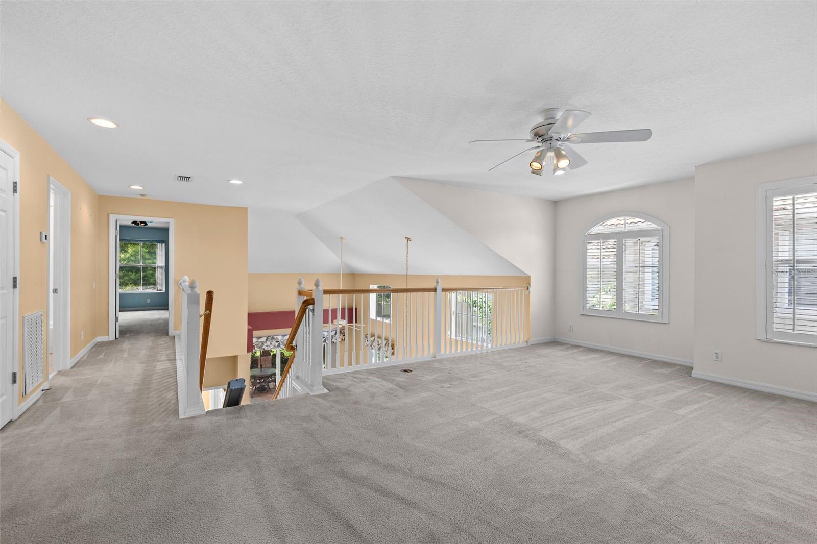 Huge Family Room overlooks living area.