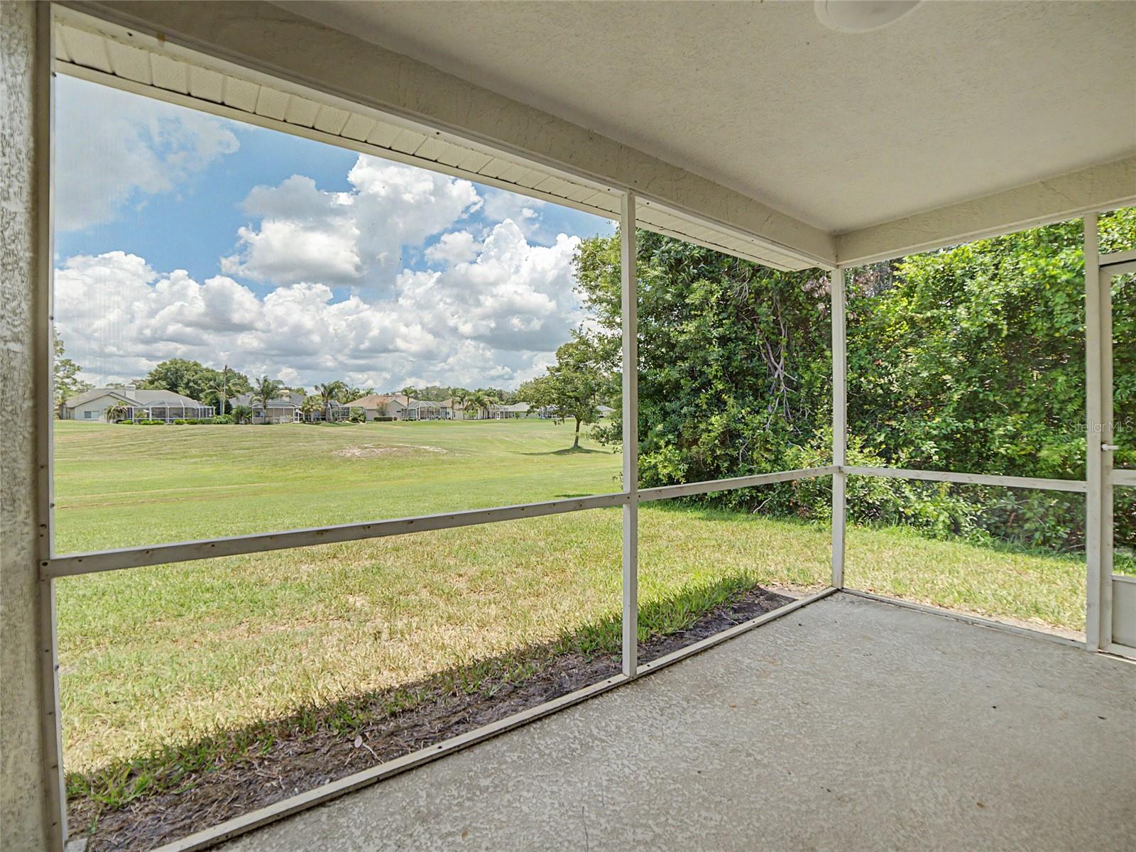 screened lanai with golf course frontage