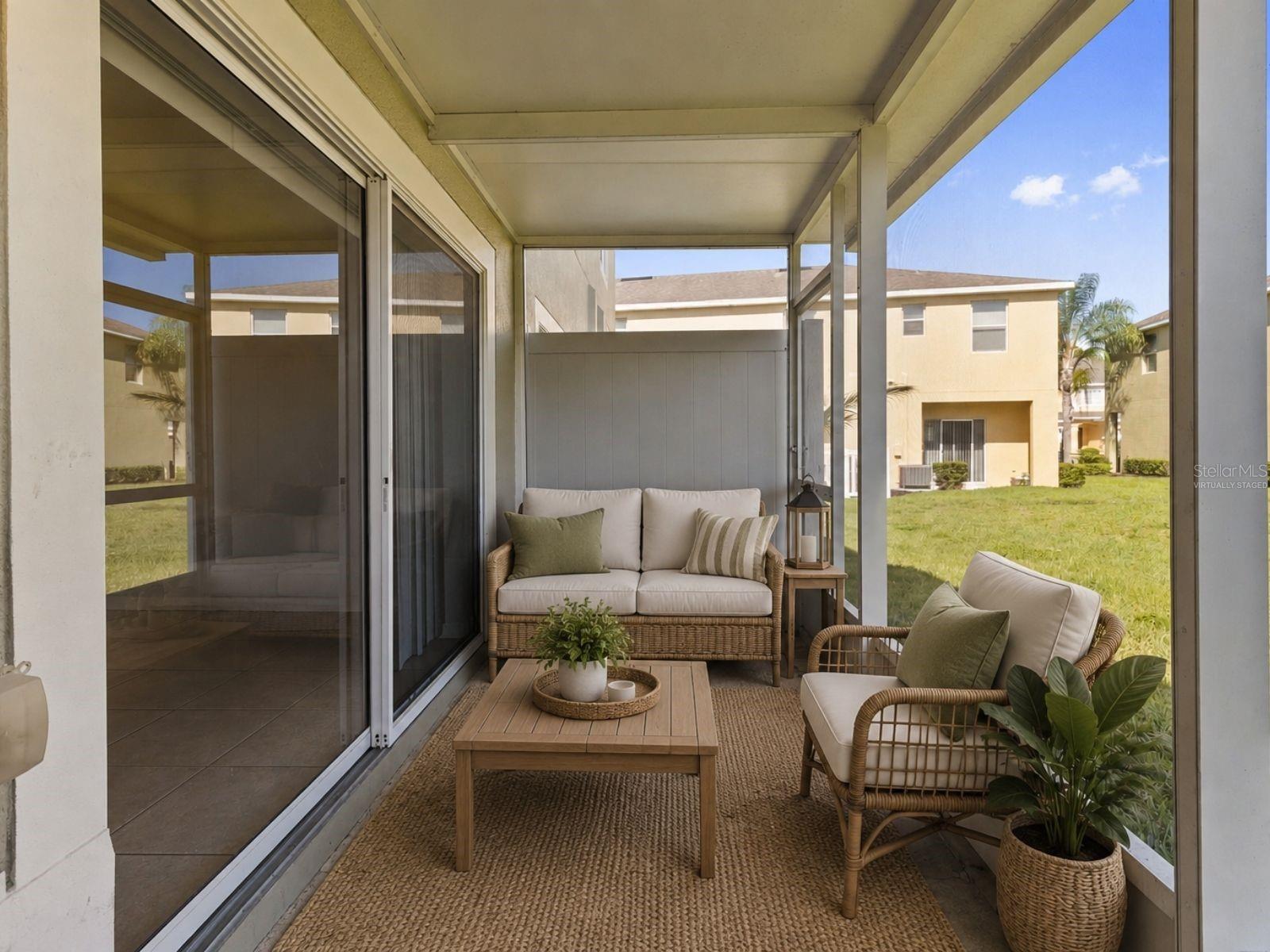 Virtually Staged-Rear Exterior Lanai: Covered & Screened