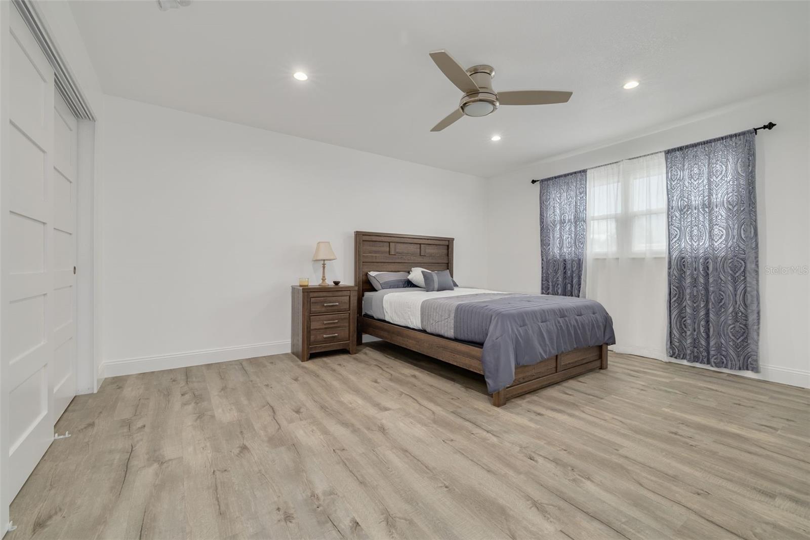 2nd Bedroom with high-end 5 panel doors and a spacious layout.