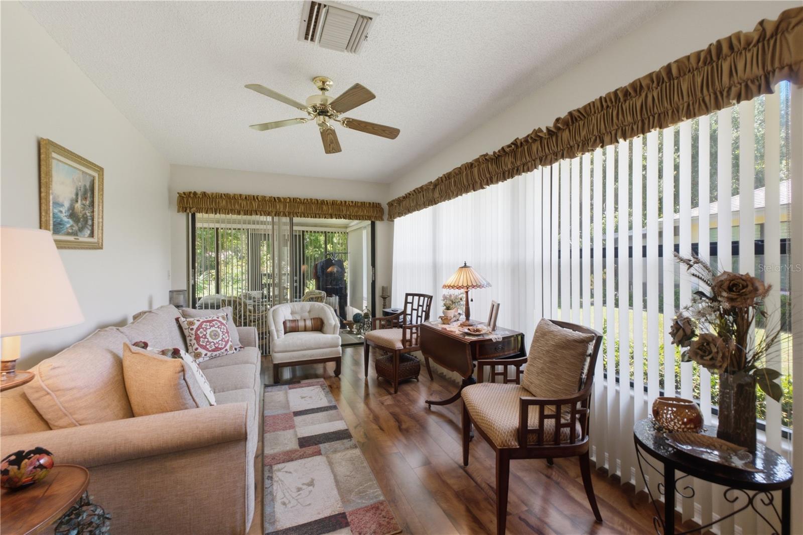 Living Room w sliders out to Florida Room