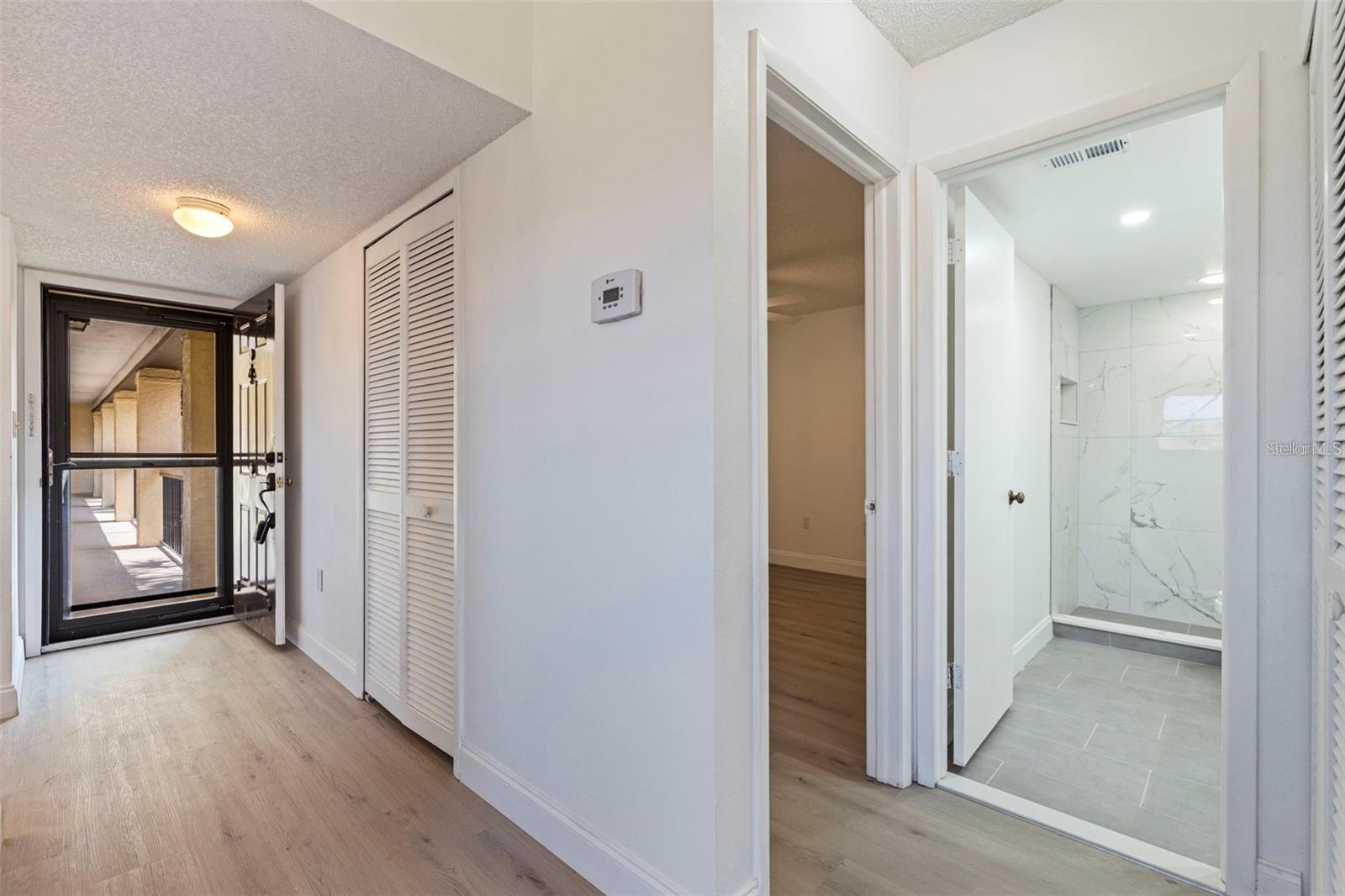 Front door, Hallway Bath and 2nd Bedroom