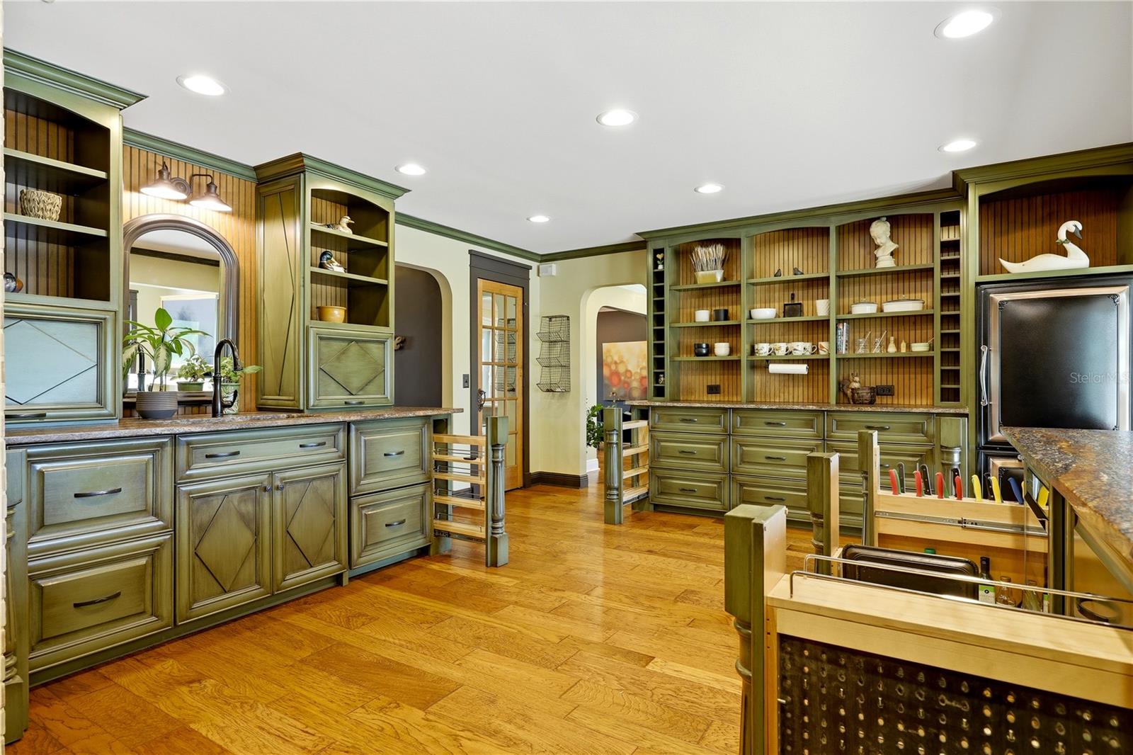 Kitchen features hidden drawers and pullouts