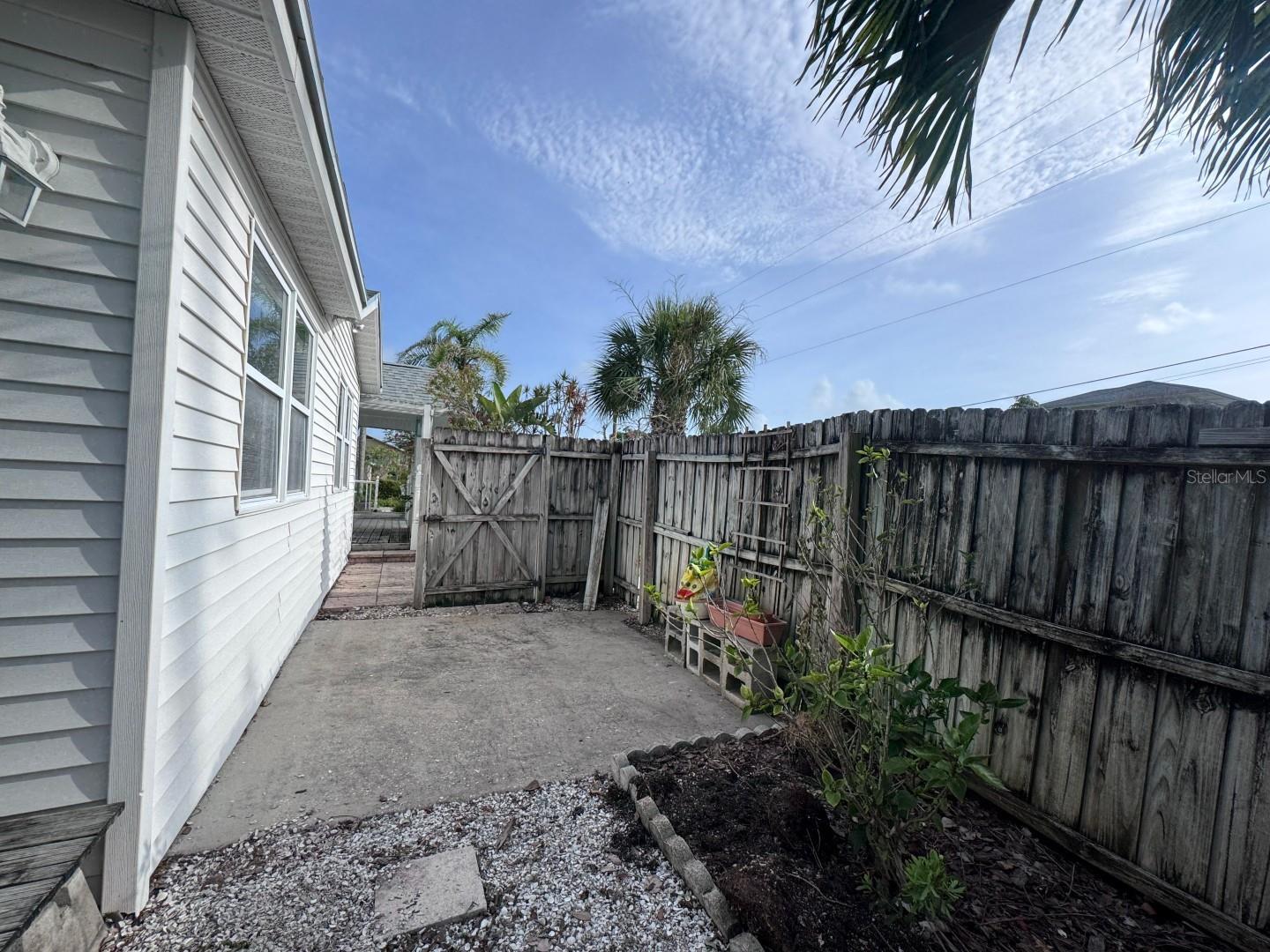 Front Side Yard (West Side)