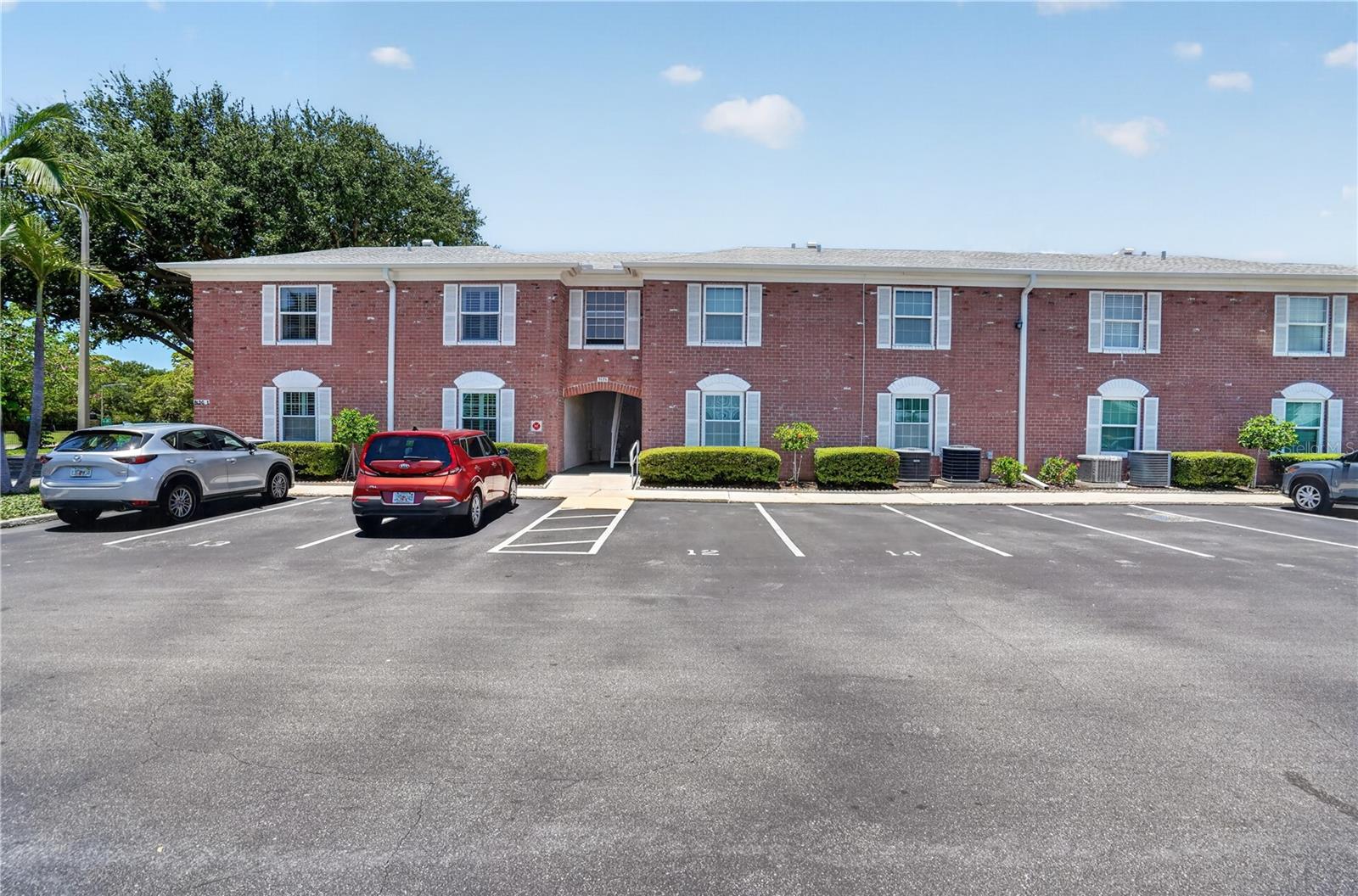 Condo  on ground floor is located to the right of entrance.