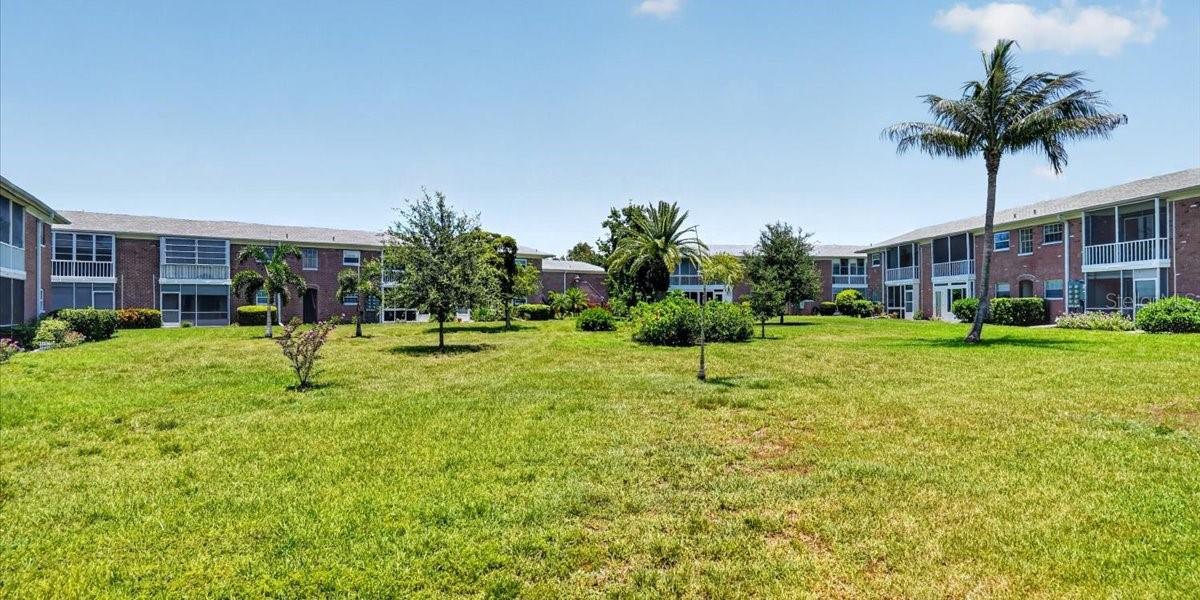 View of green space in back of lanai
