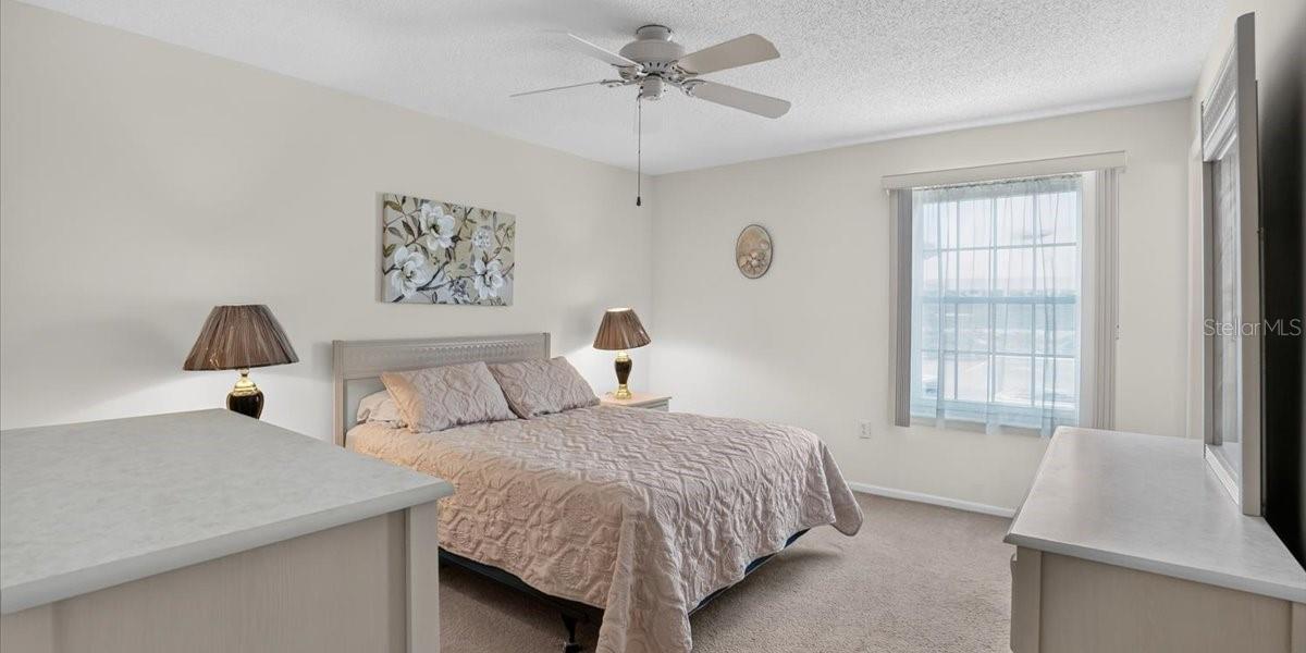 Primary bedroom with ensuite bathroom and walk-in closet.