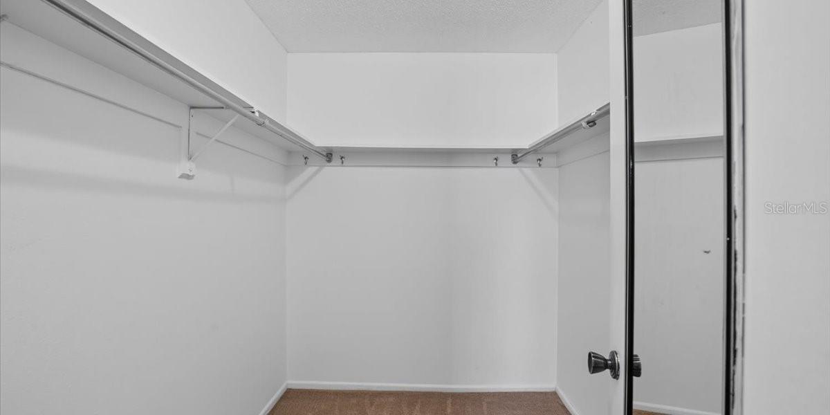 Spacious walk-in closet in primary bedrom