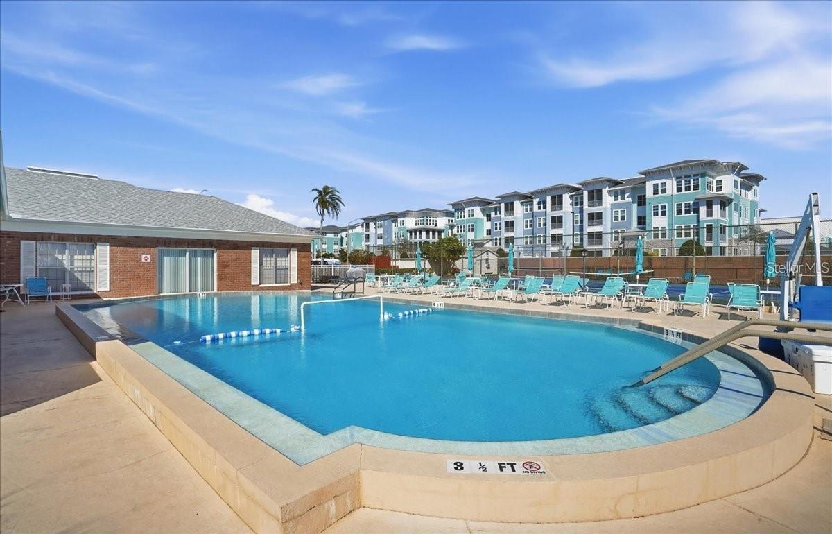 Heated large swimming pool just steps away from condo,