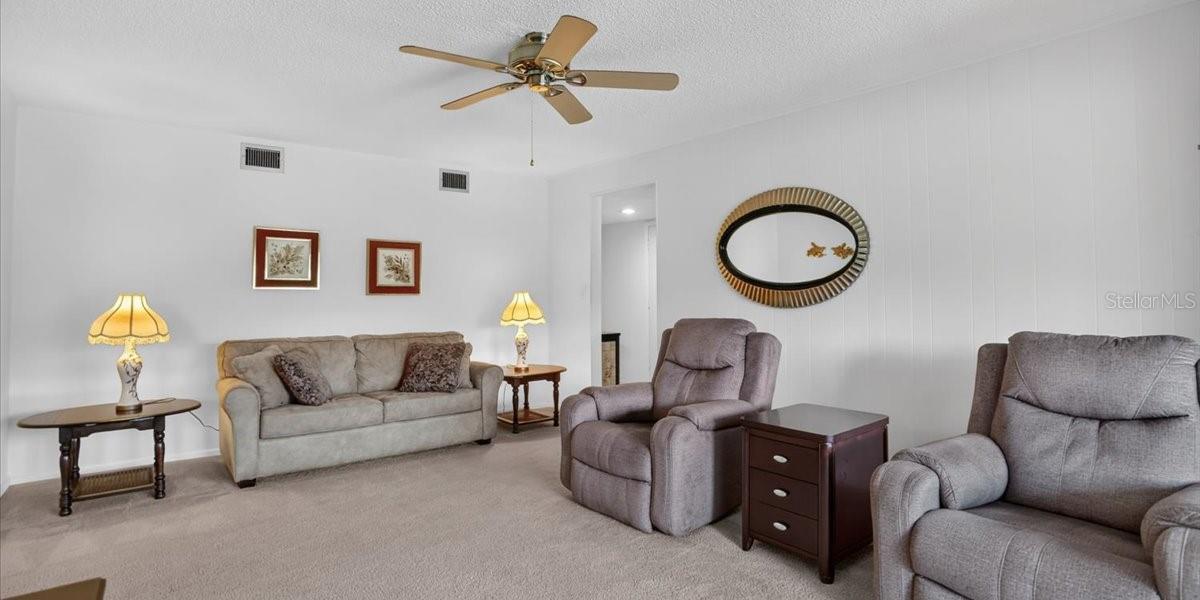 Another view of living room.  Entry from foyer ito the right in back.