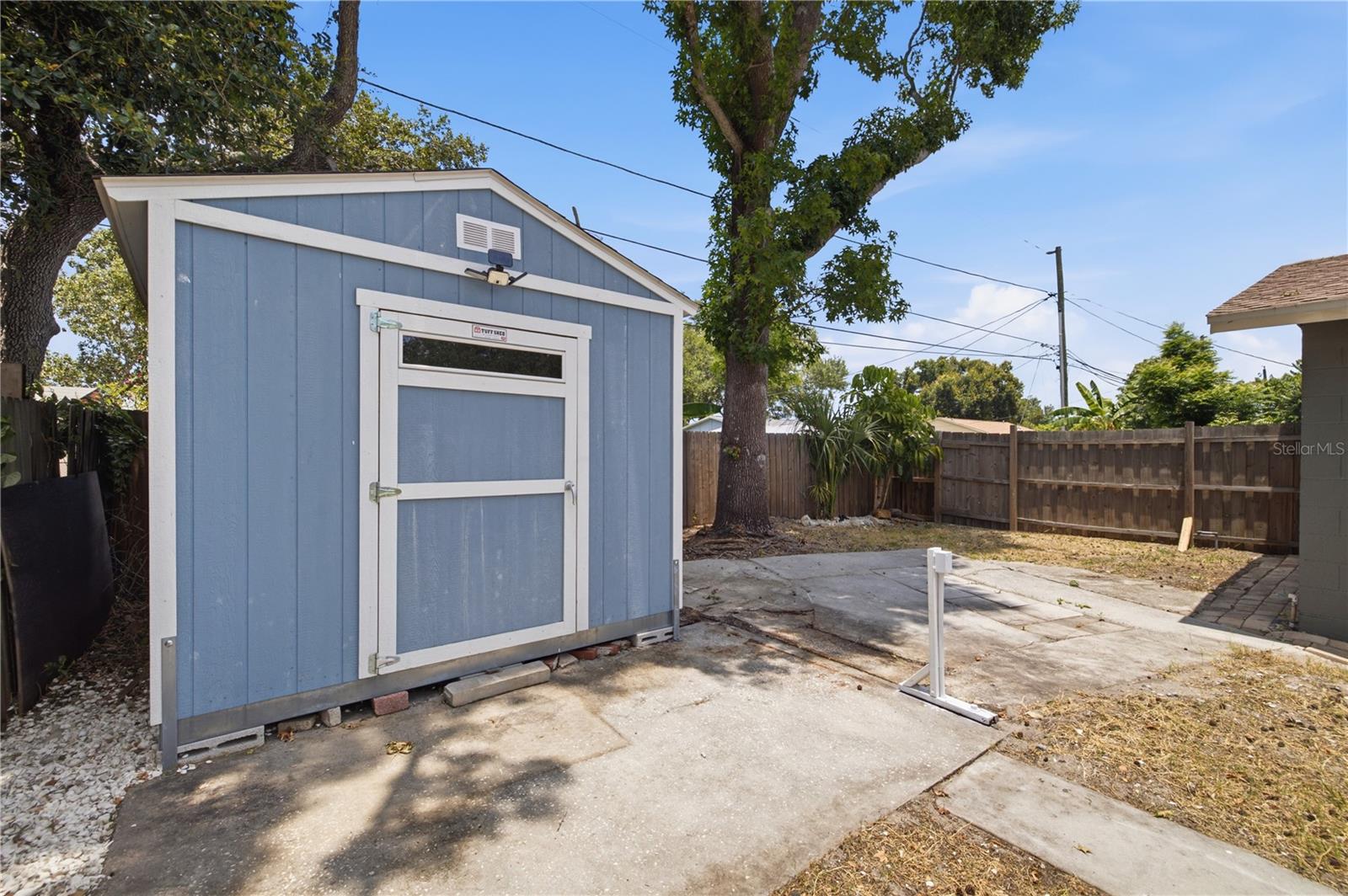 New shed on left side of home in the rear