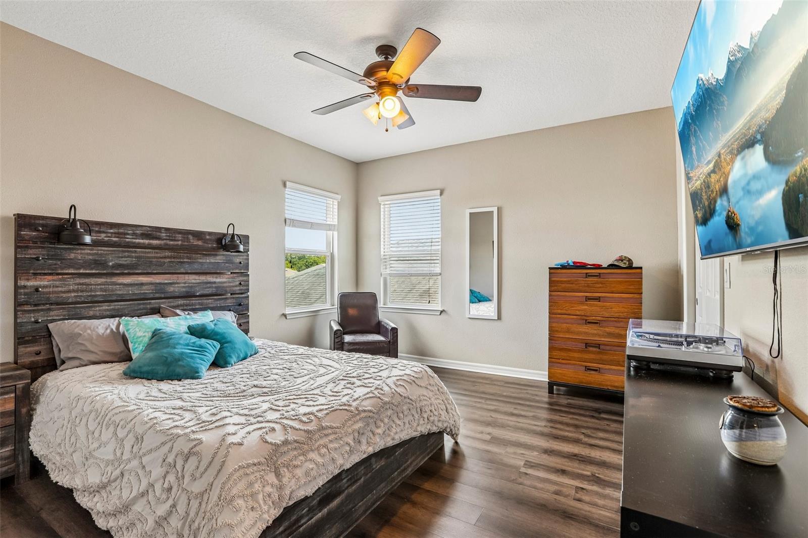 Bedroom 4 with new laminate flooring, walk in closet and ensuite bathroom
