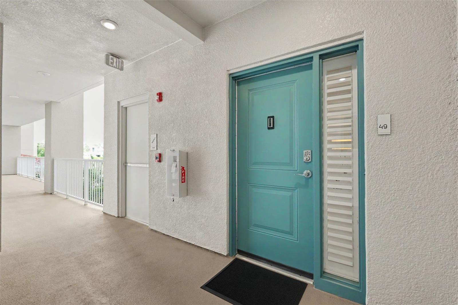 Nice entranceway, close to the elevator and next to the stairs.