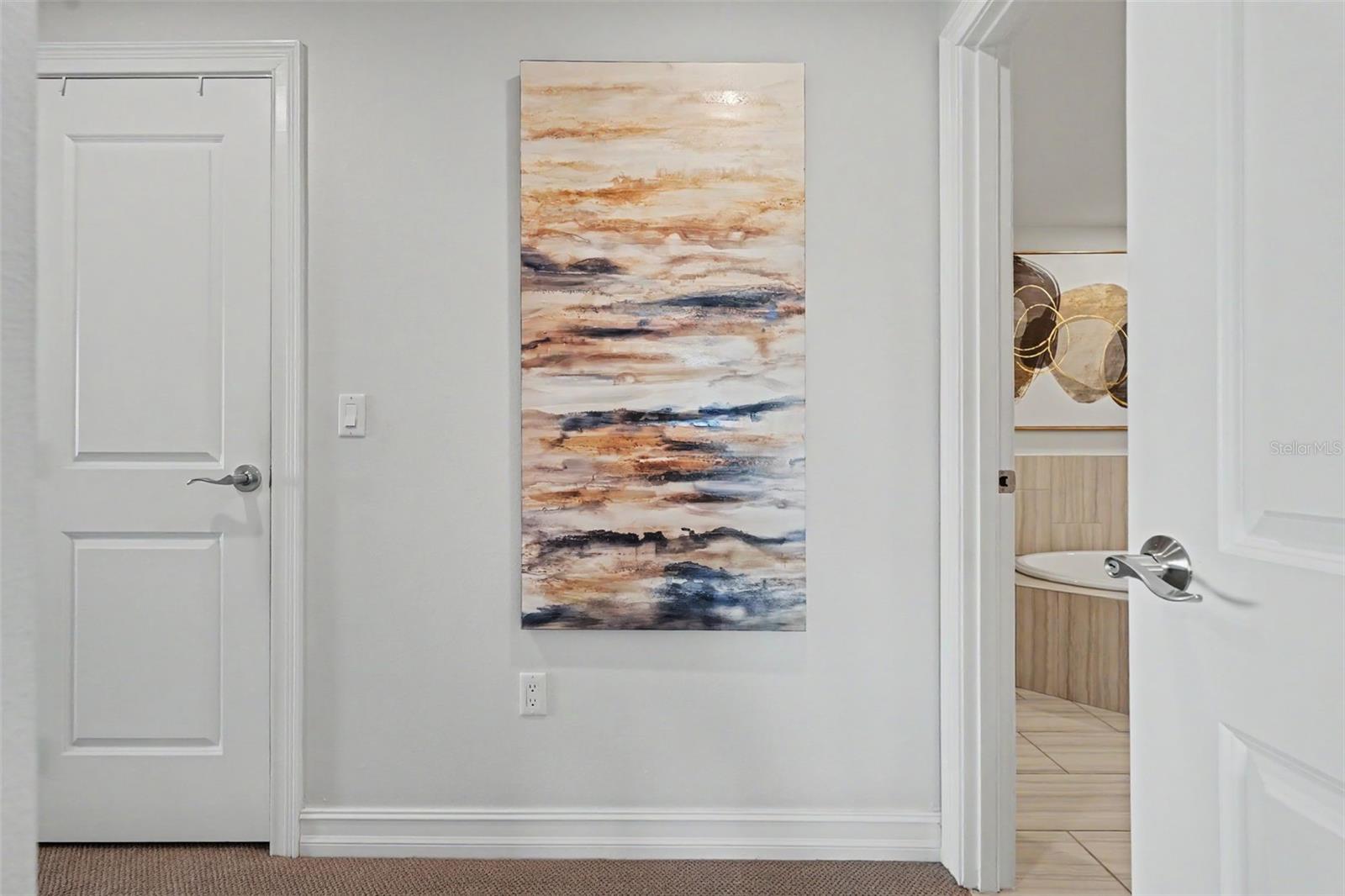 Hallway to master bedroom and master bathroom.