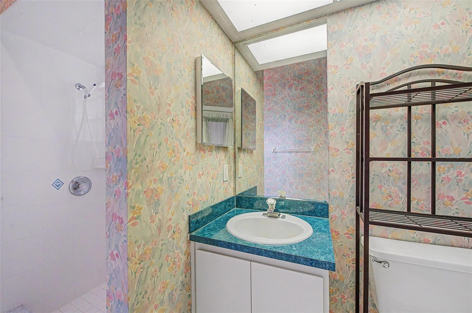 Spacious third bedroom featuring a comfortable layout, abundant natural light, and ample closet space.
