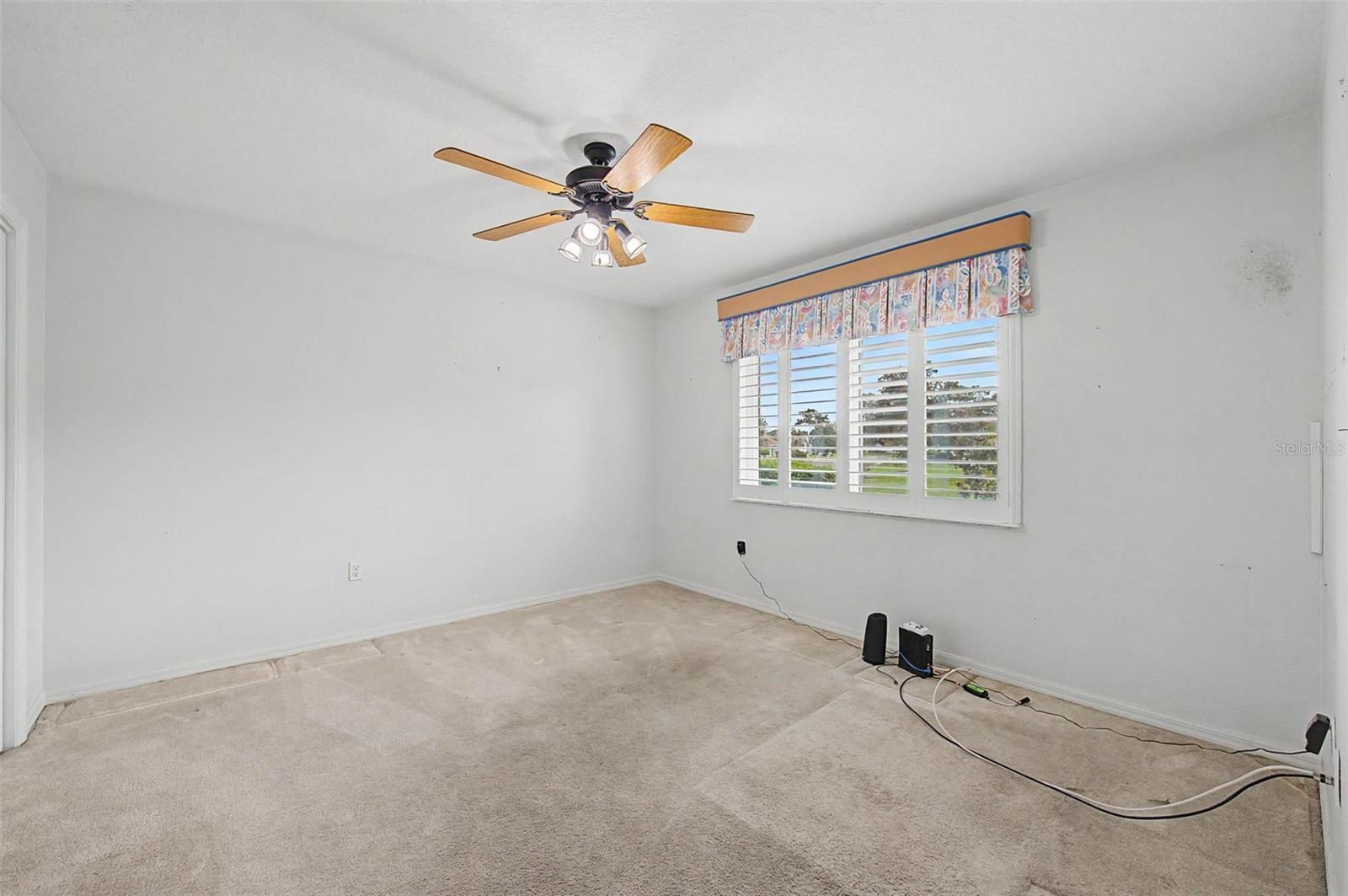 Versatile fourth bedroom offering a comfortable layout and flexibility to suit your needs. Ideal as a guest room, home office, hobby room, or additional bedroom, this space provides endless possibilities to fit your lifestyle.