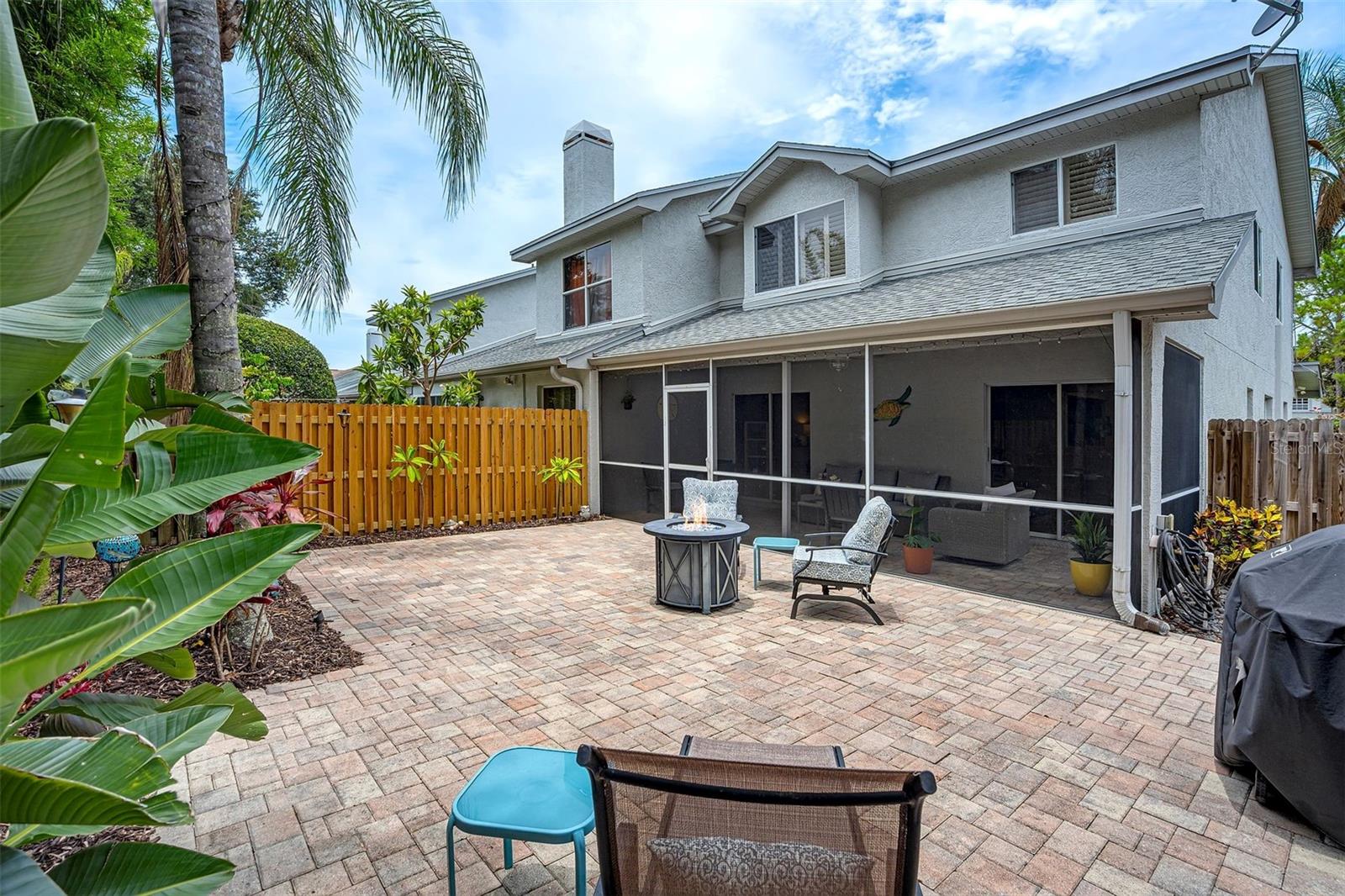 Paved and Fenced Back Yard